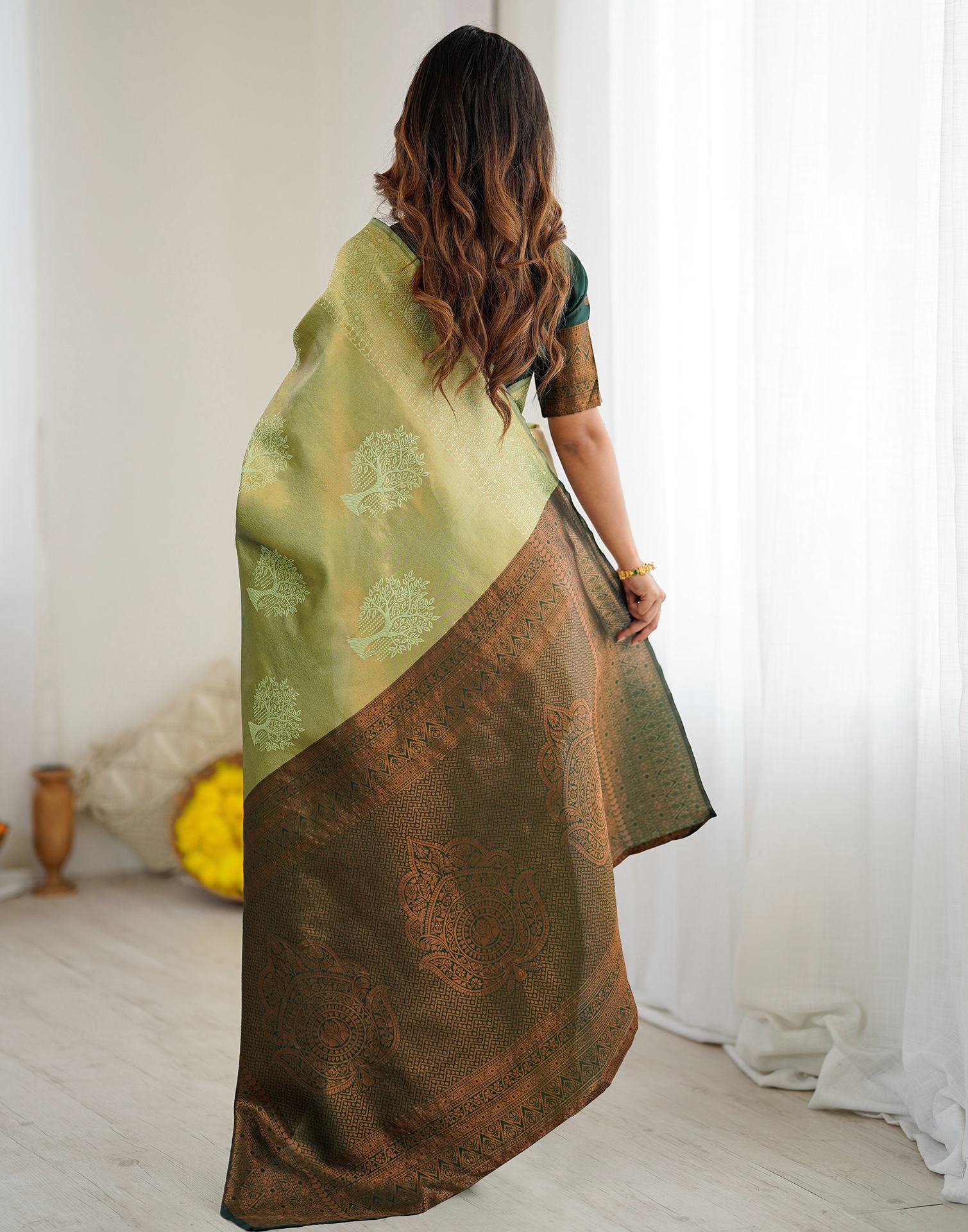 Pista Green Silk Woven Saree