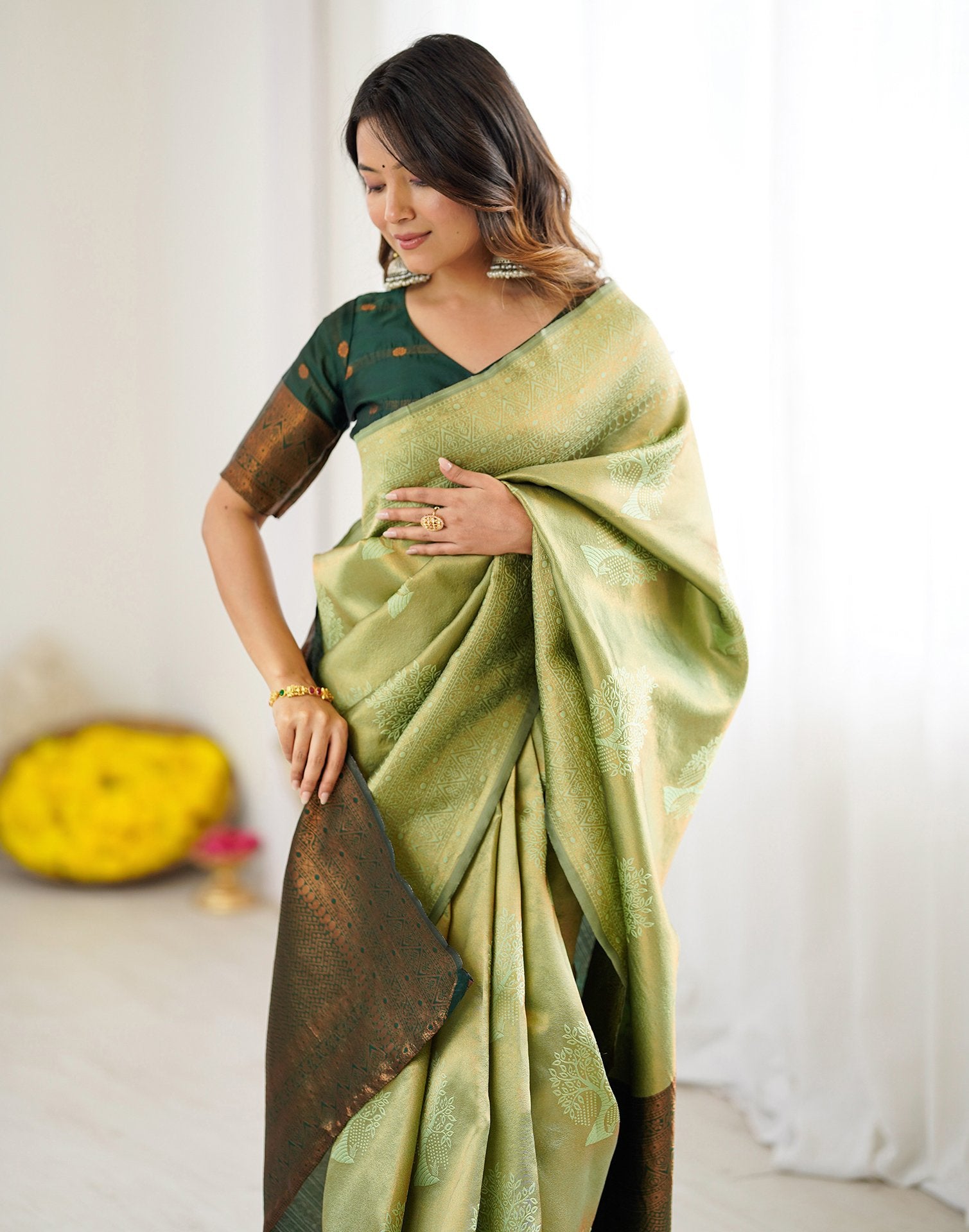 Pista Green Silk Woven Saree
