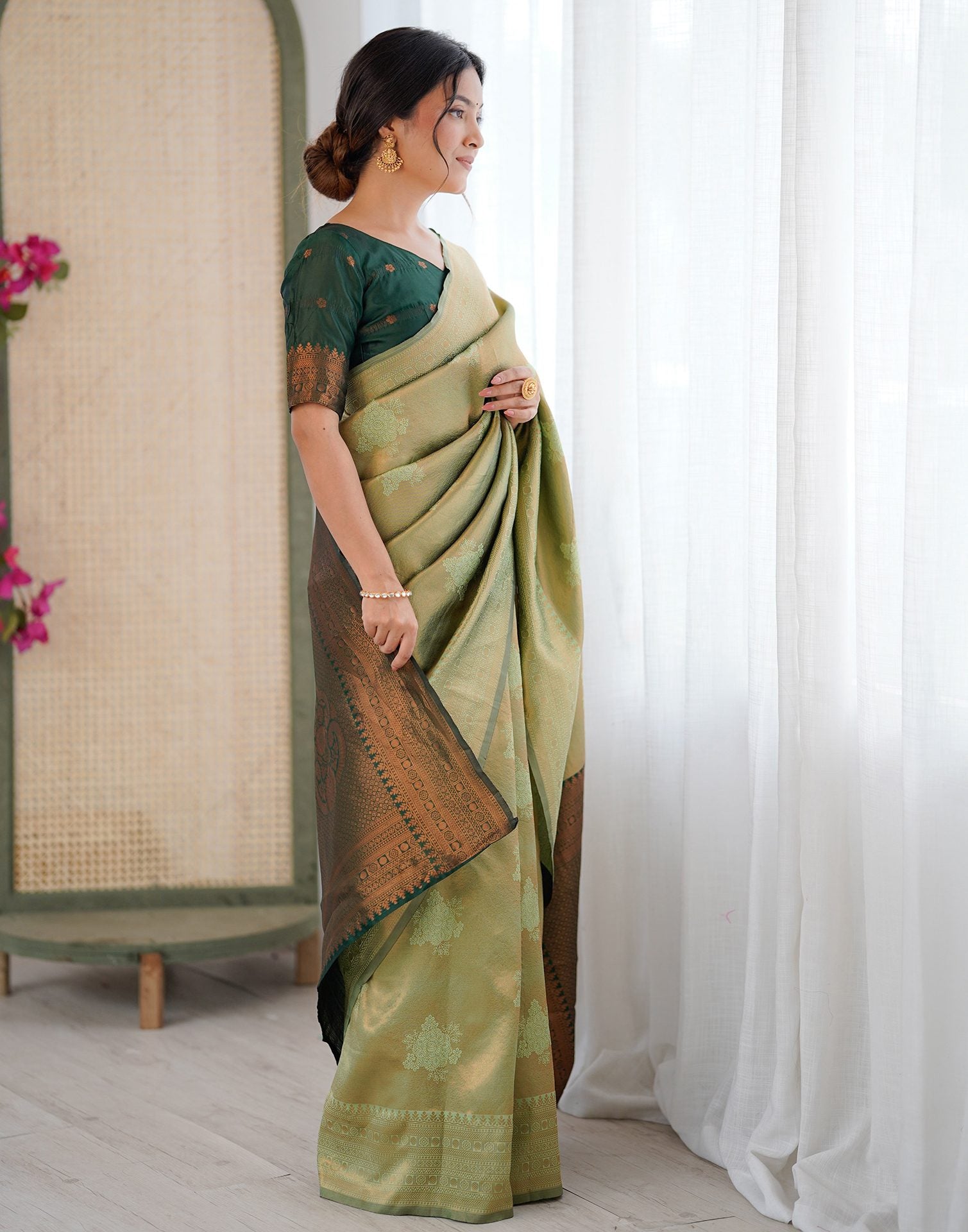 Pista Green Silk Woven Saree