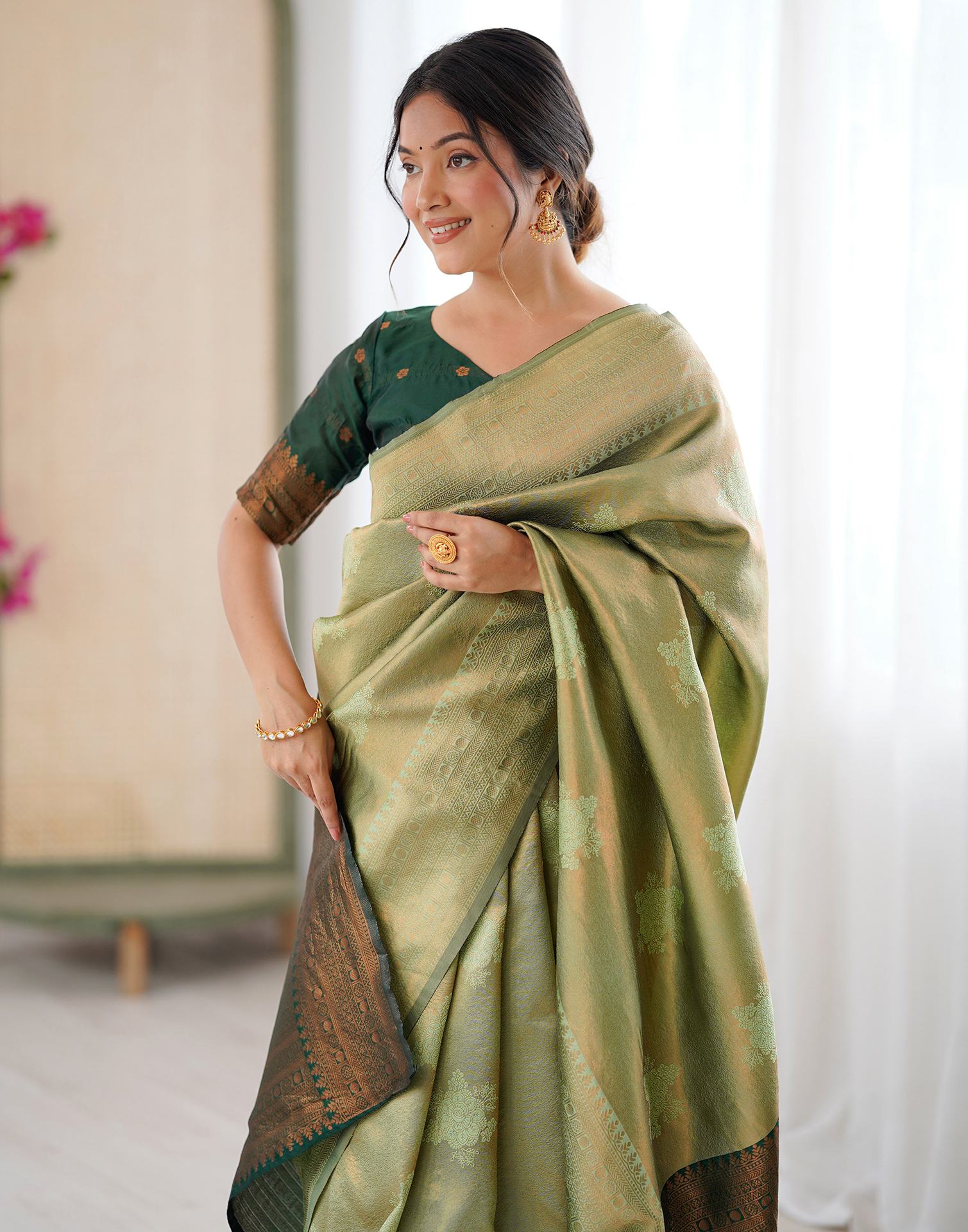 Pista Green Silk Woven Saree