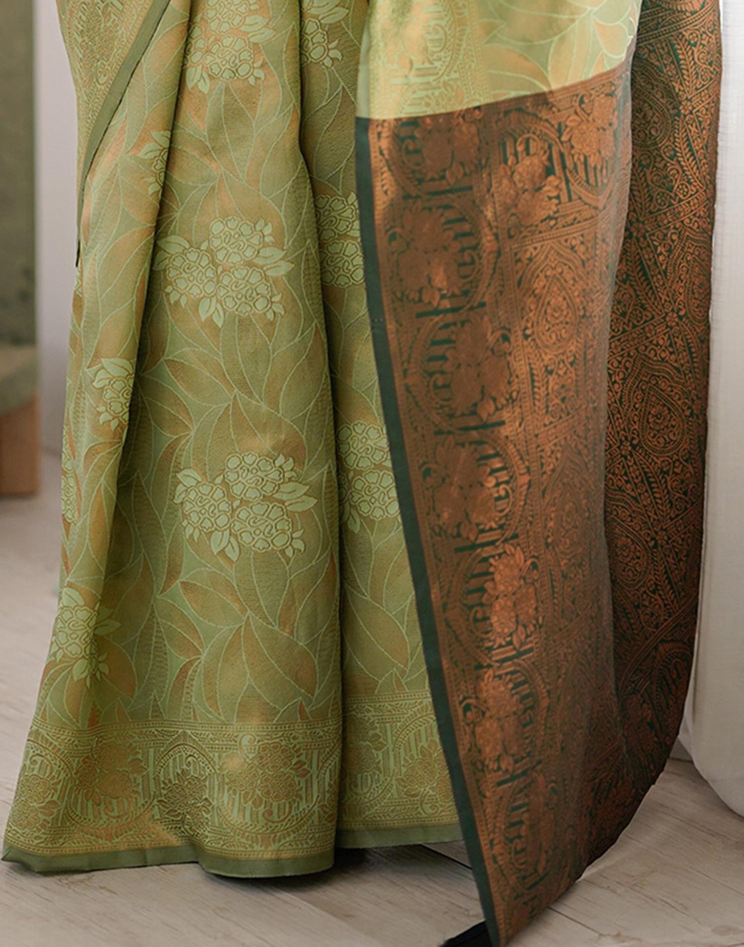 Pista Green Silk Woven Saree
