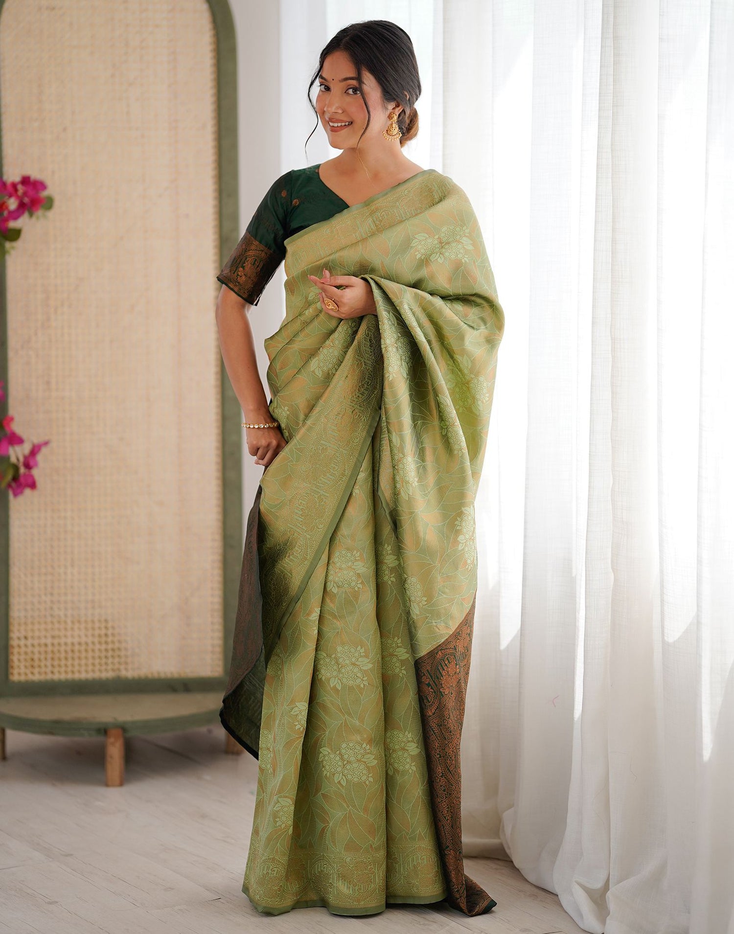 Pista Green Silk Woven Saree