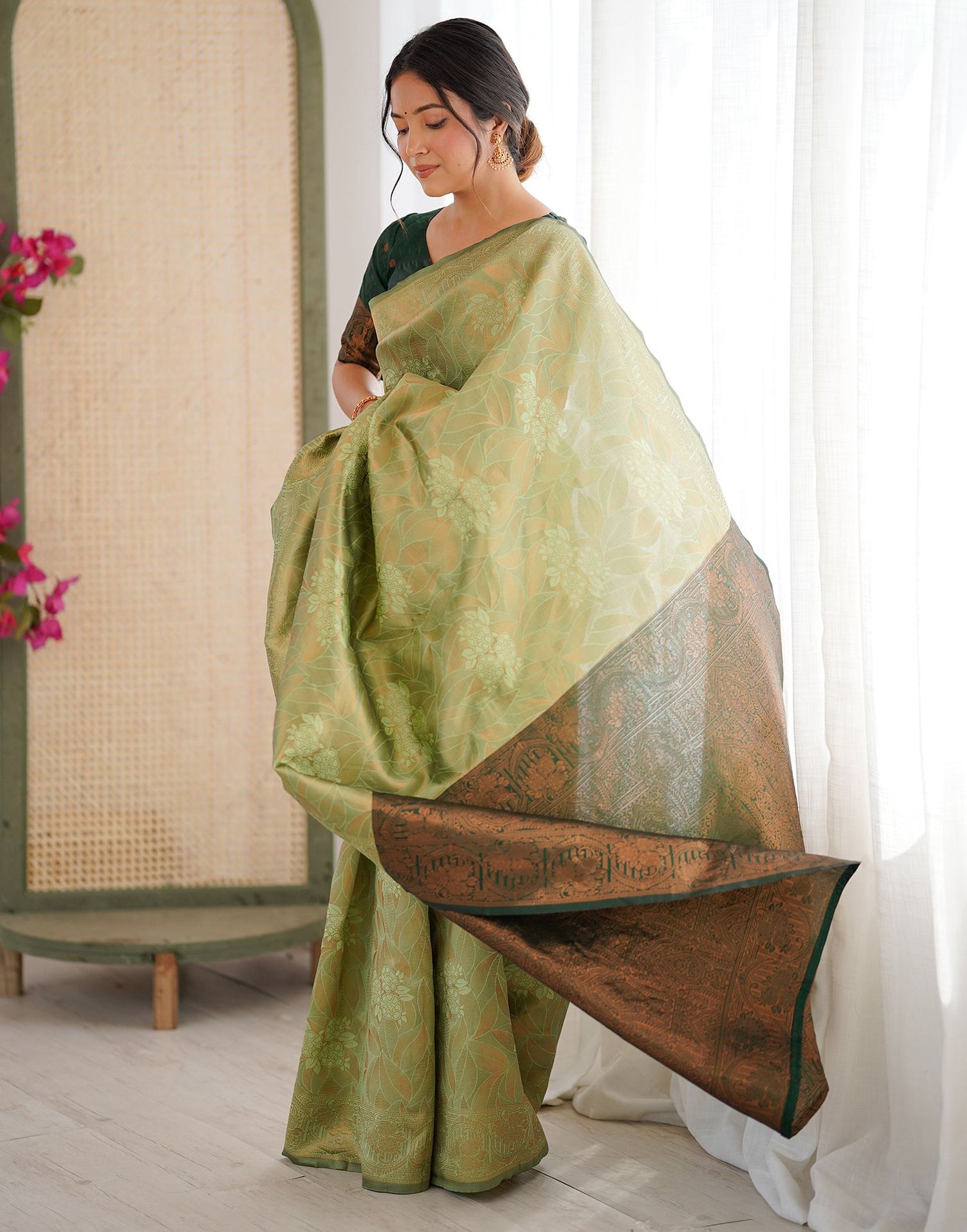 Pista Green Silk Woven Saree