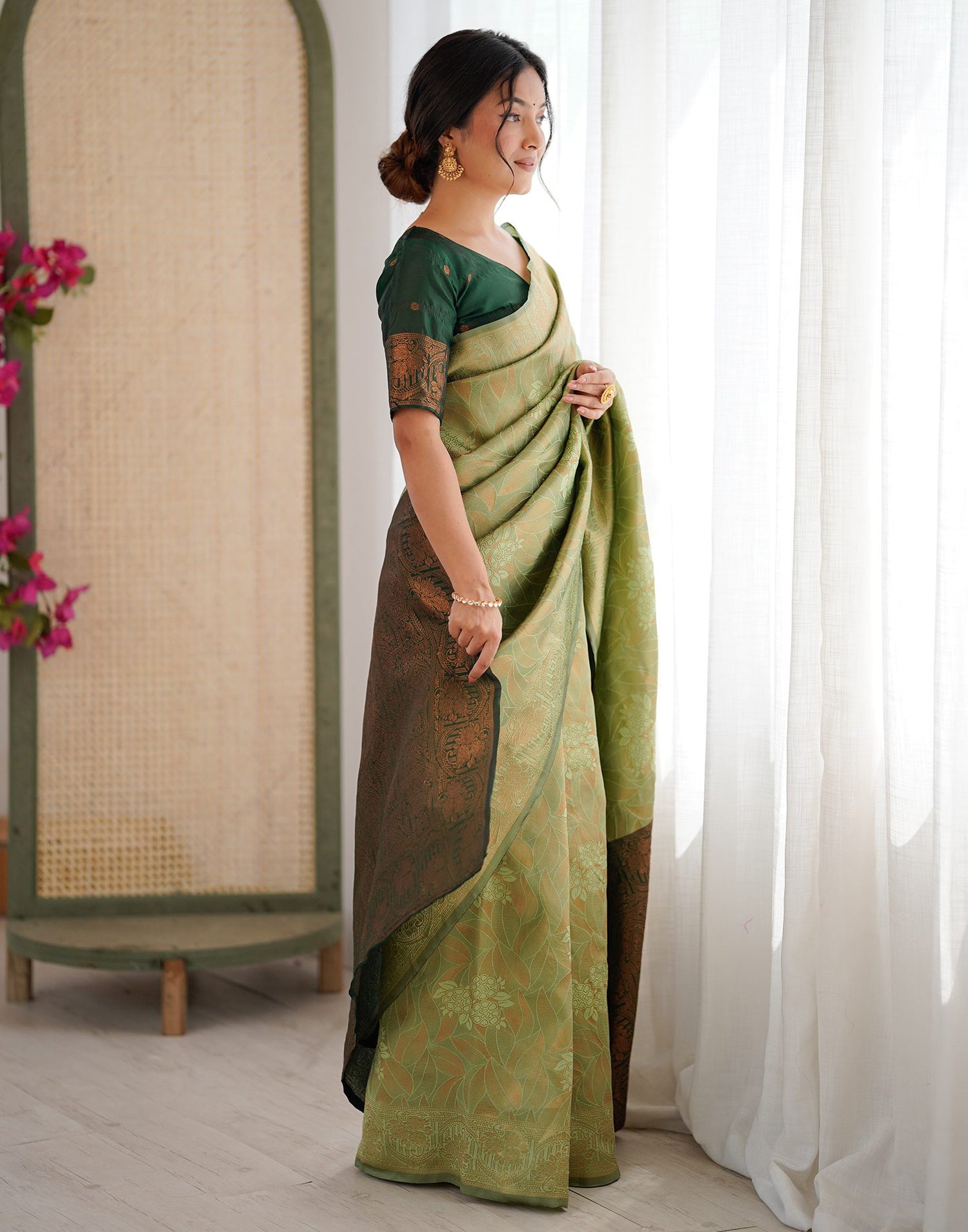 Pista Green Silk Woven Saree