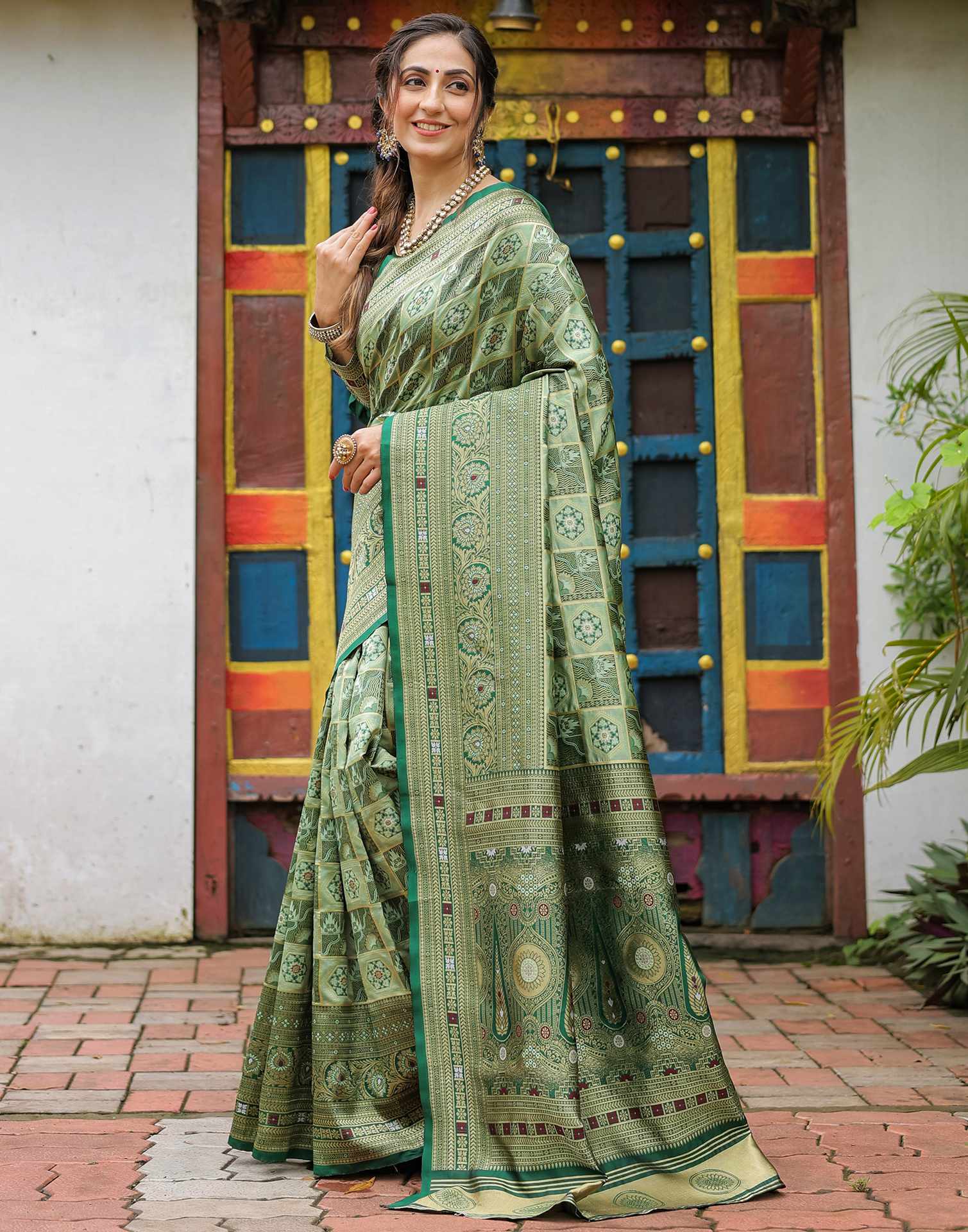Pista Green Silk Woven Saree