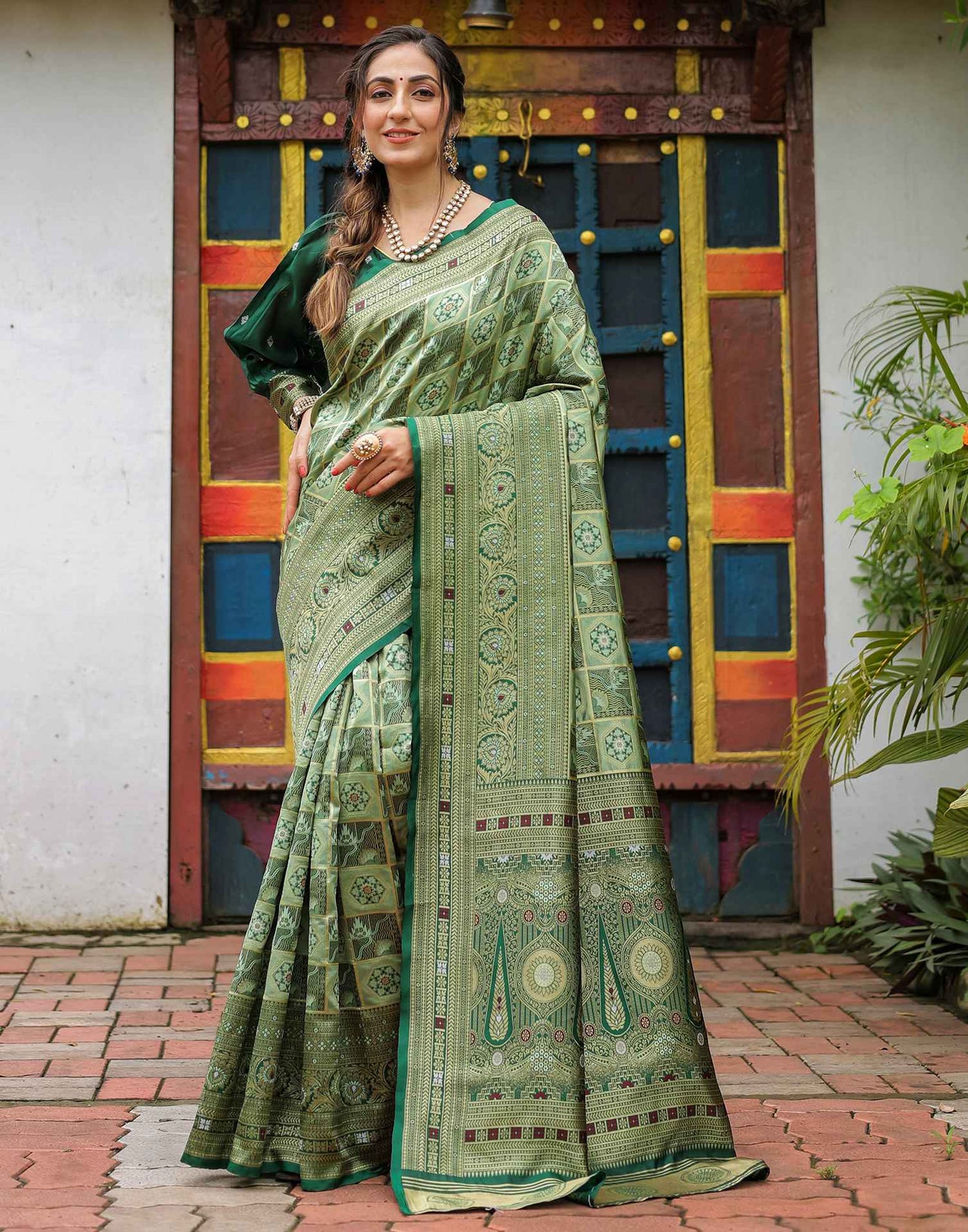 Pista Green Silk Woven Saree