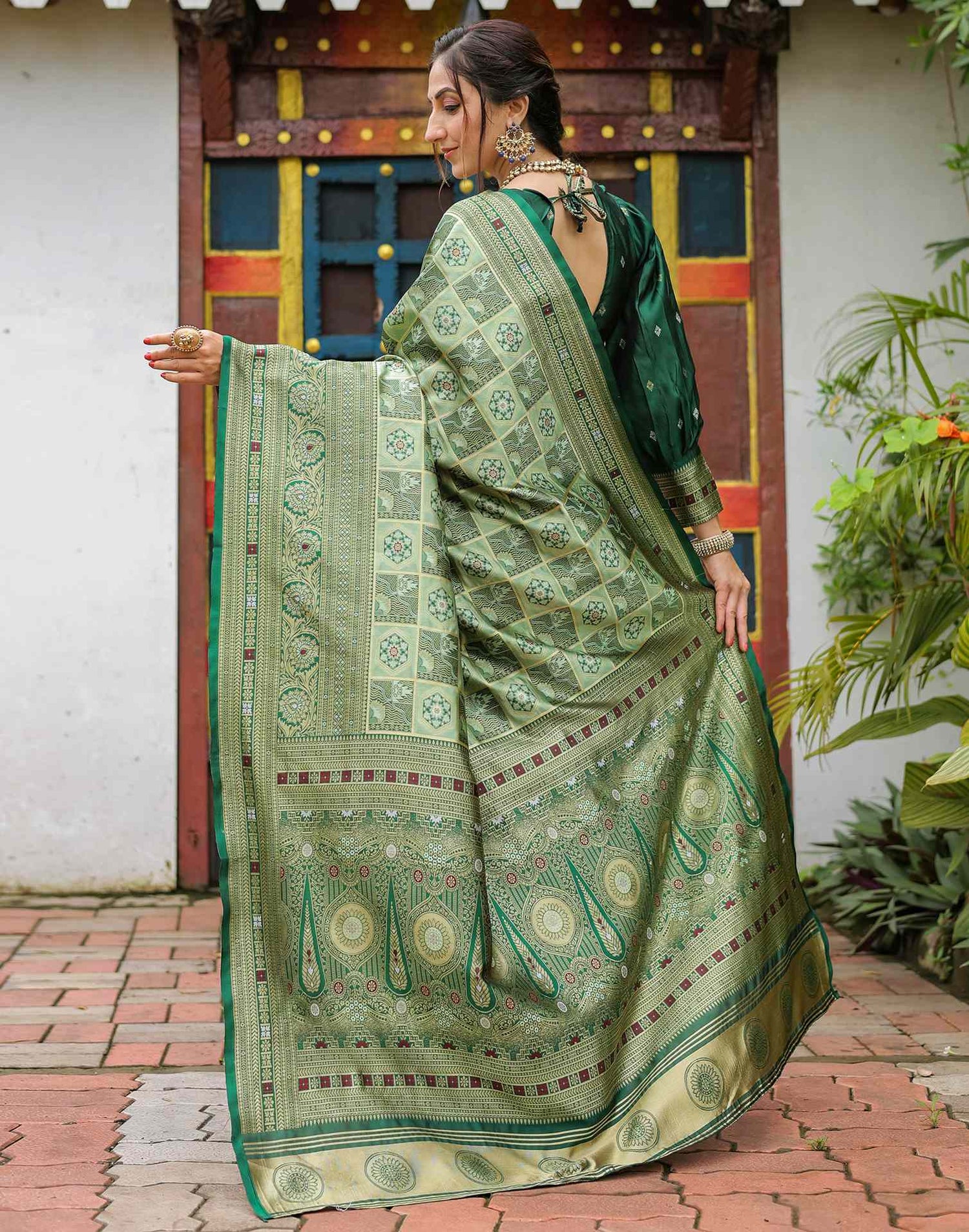 Pista Green Silk Woven Saree