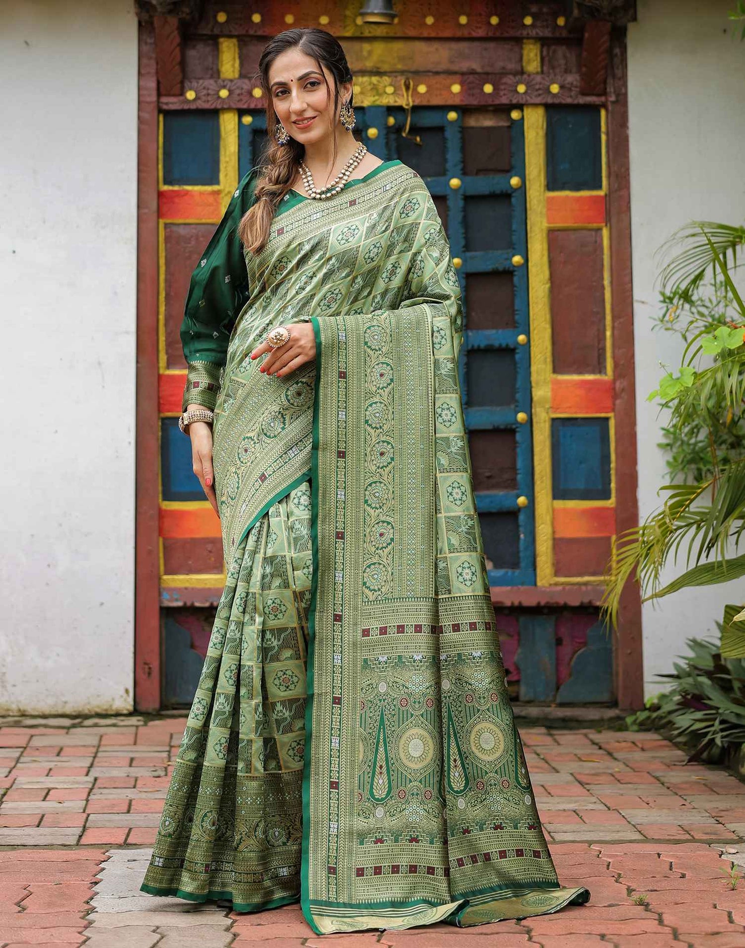 Pista Green Silk Woven Saree