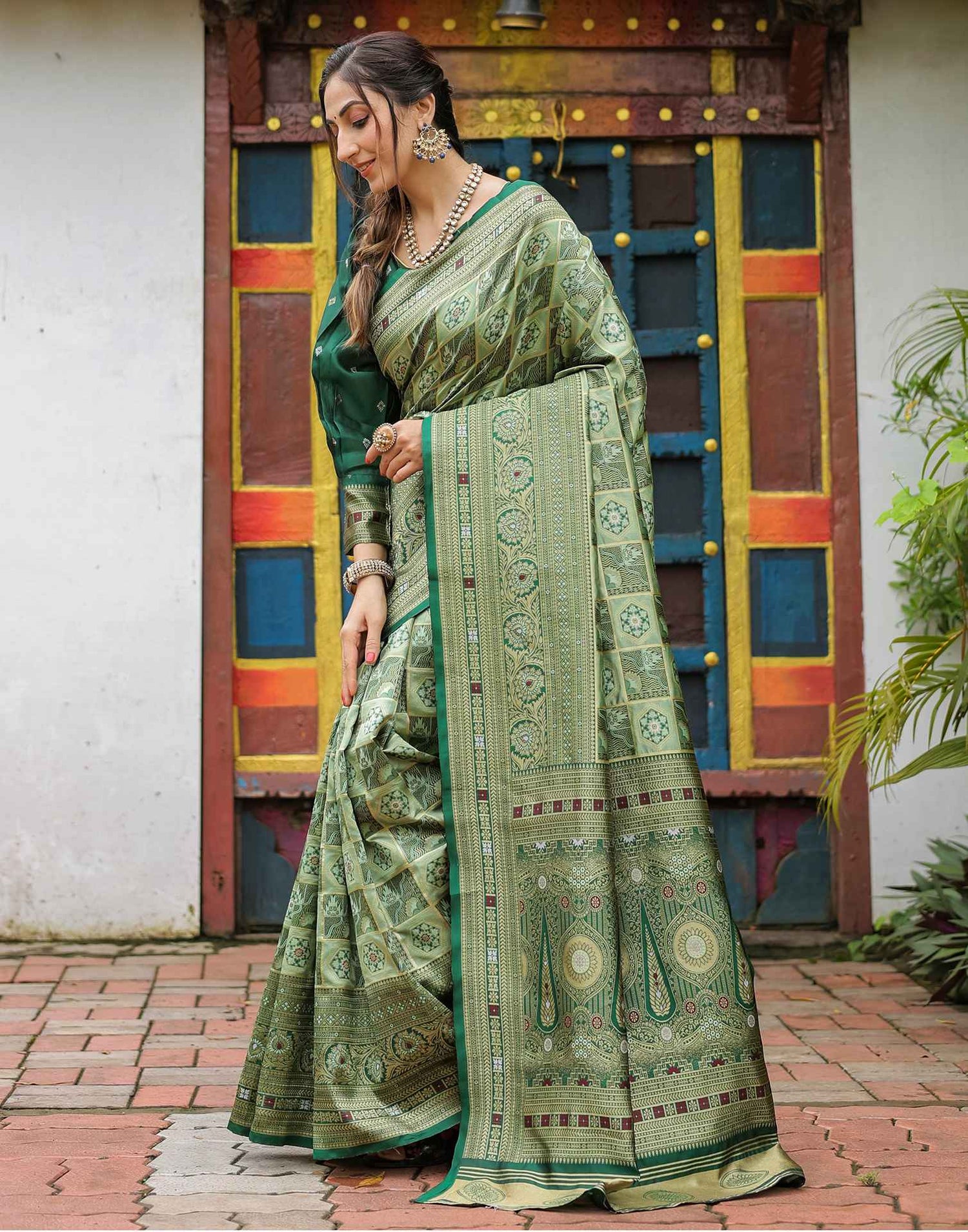 Pista Green Silk Woven Saree