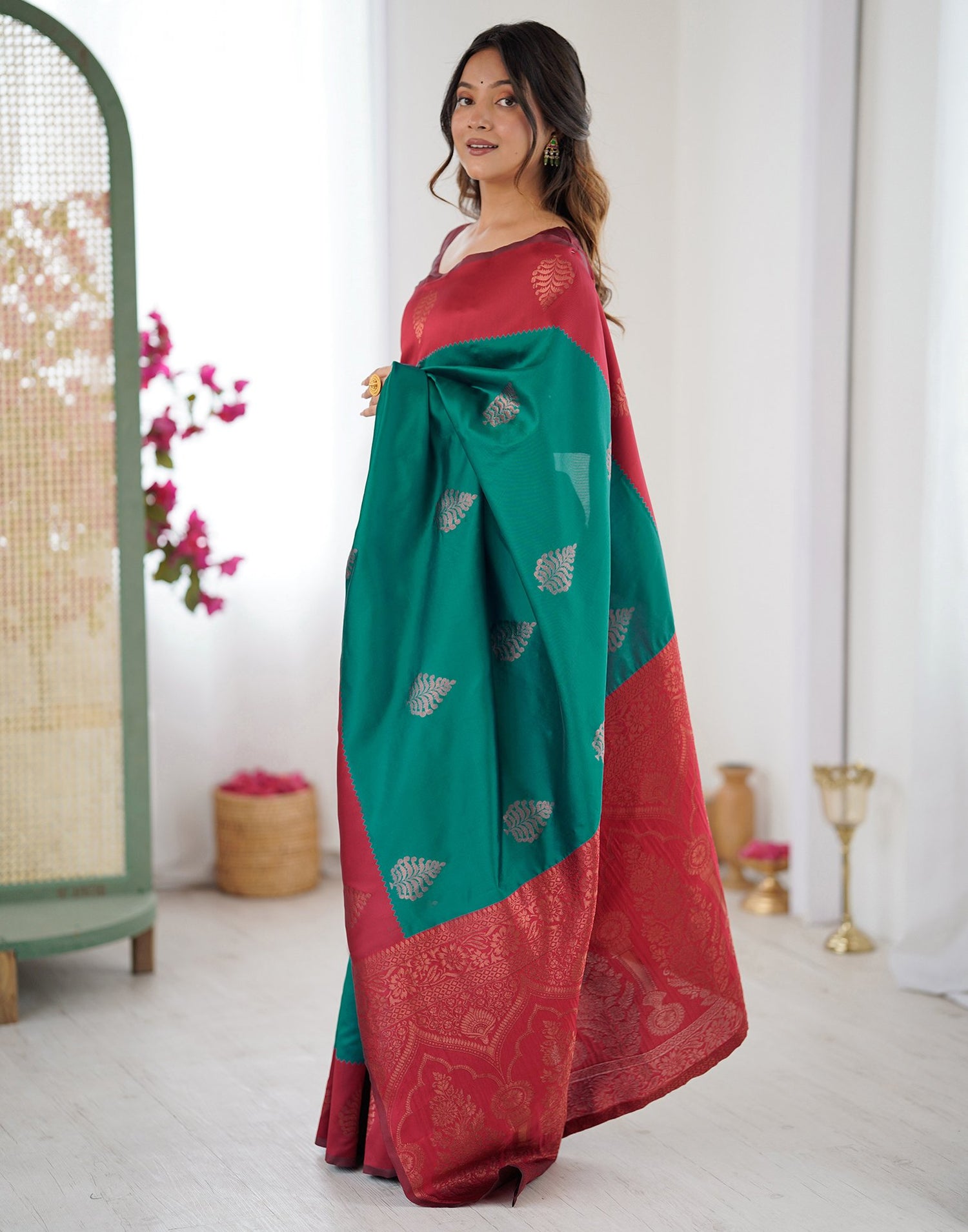 Teal Green Silk Woven Saree