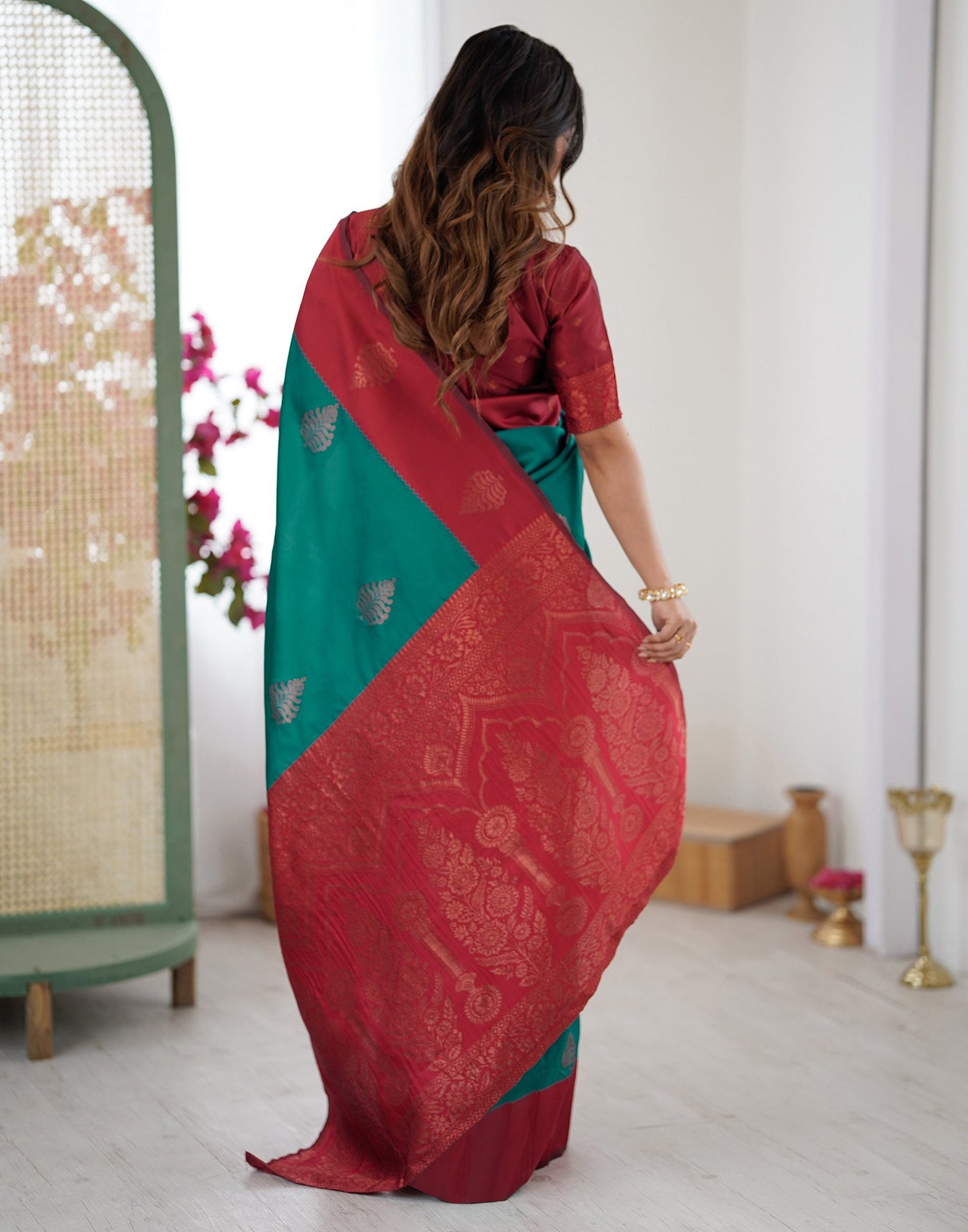Teal Green Silk Woven Saree