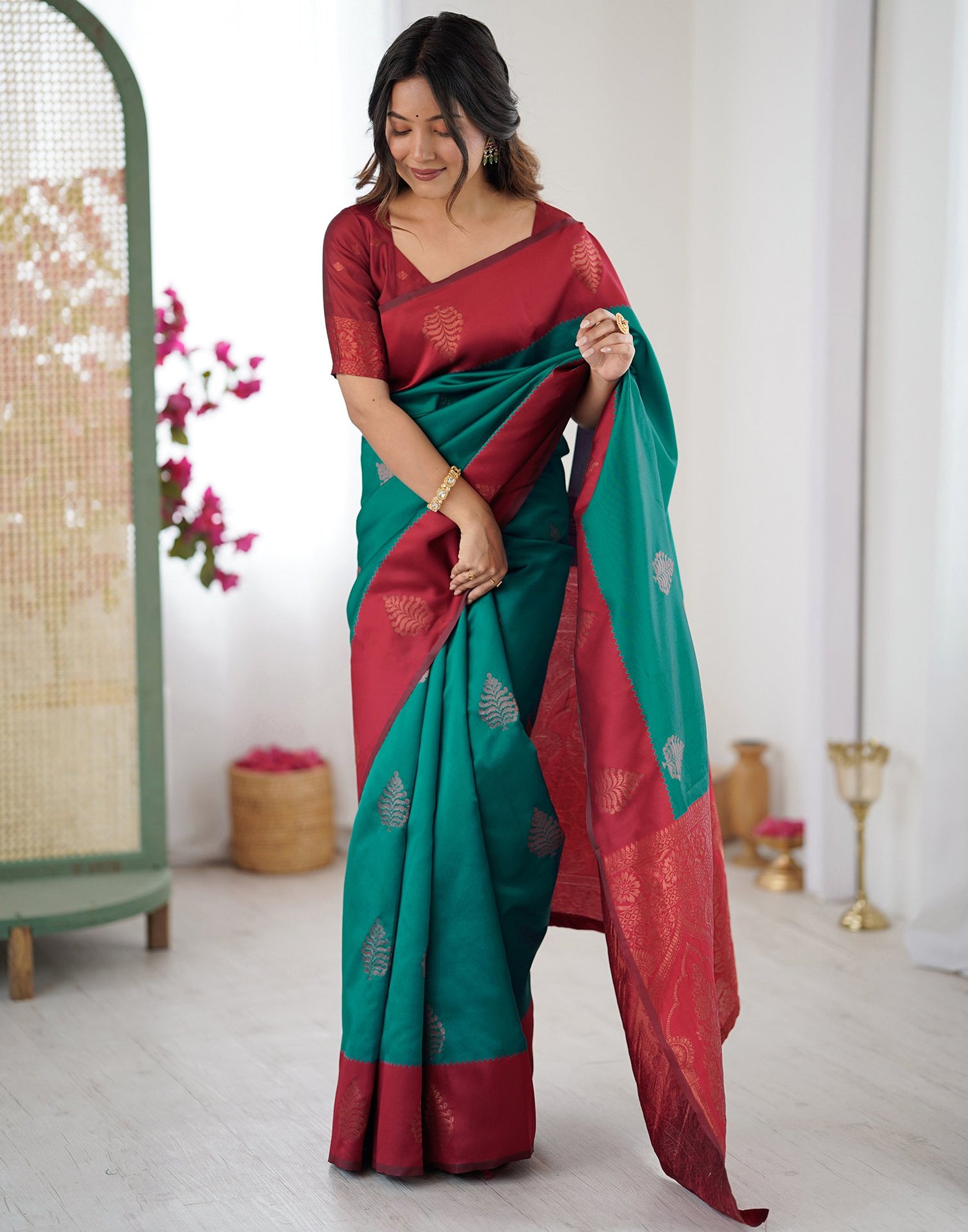 Teal Green Silk Woven Saree
