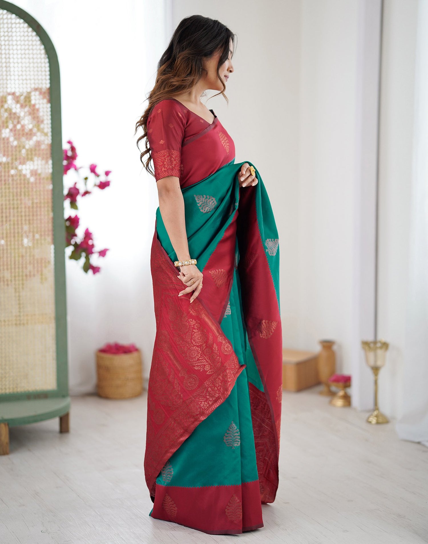 Teal Green Silk Woven Saree