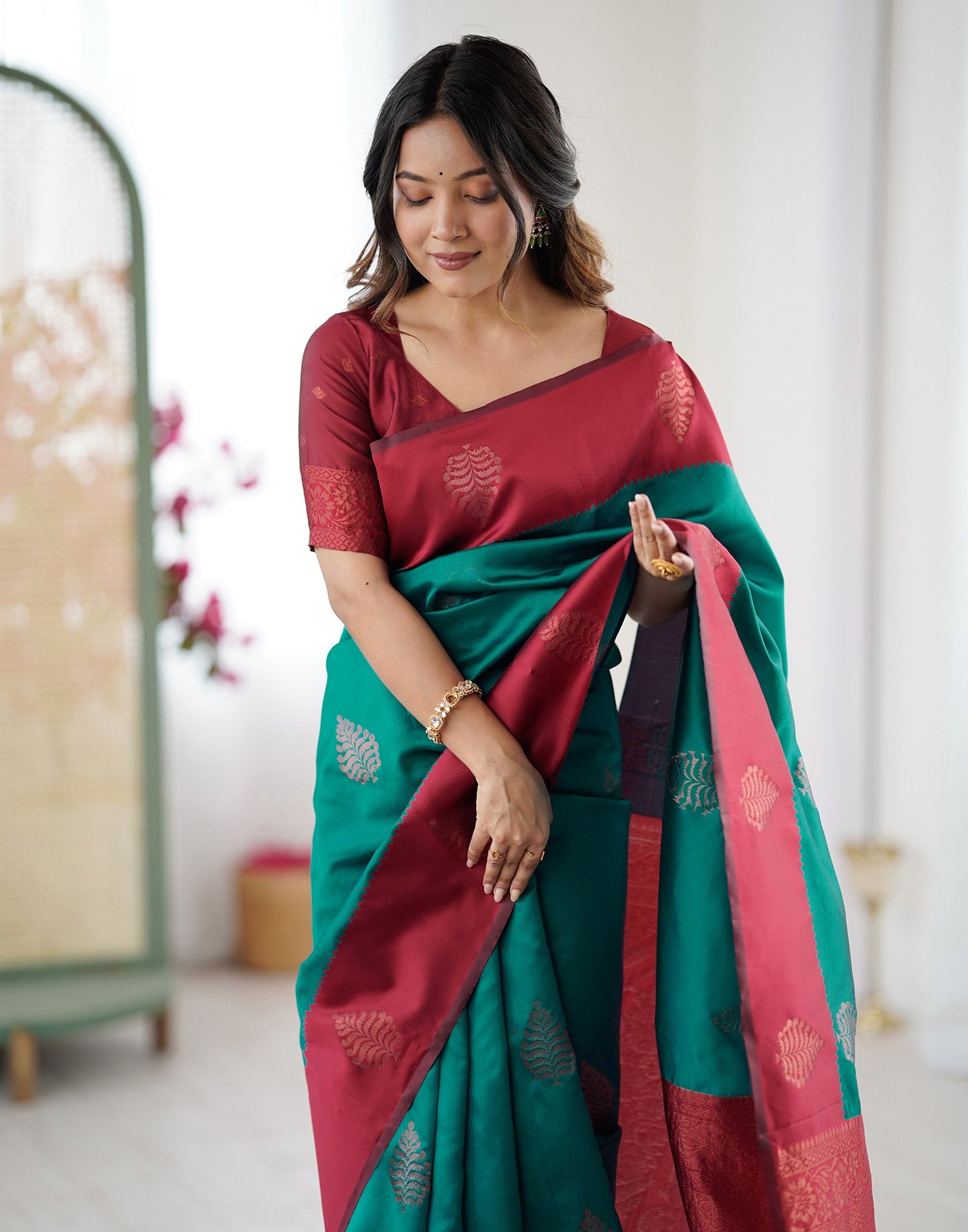 Teal Green Silk Woven Saree