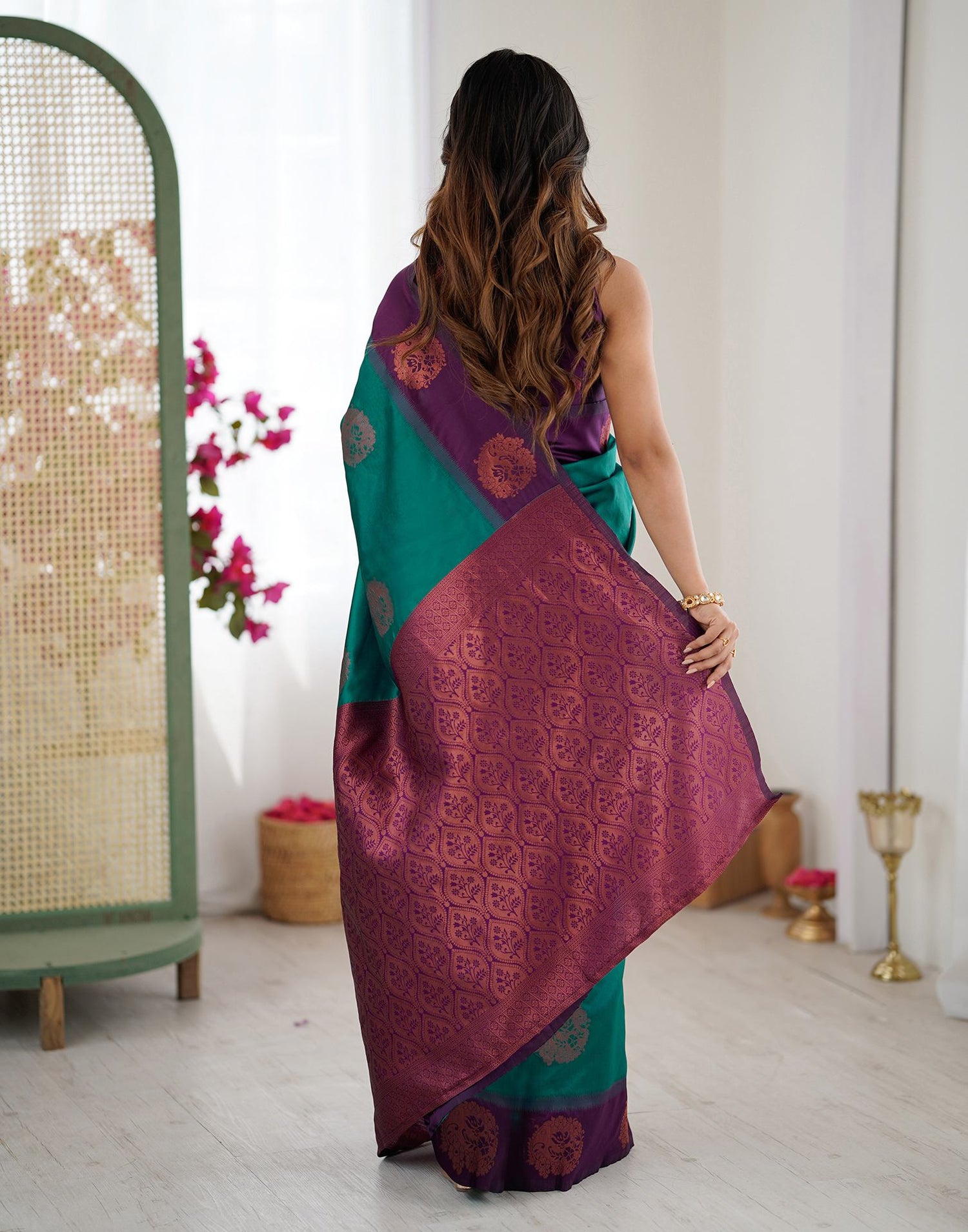 Teal Green Silk Woven Saree