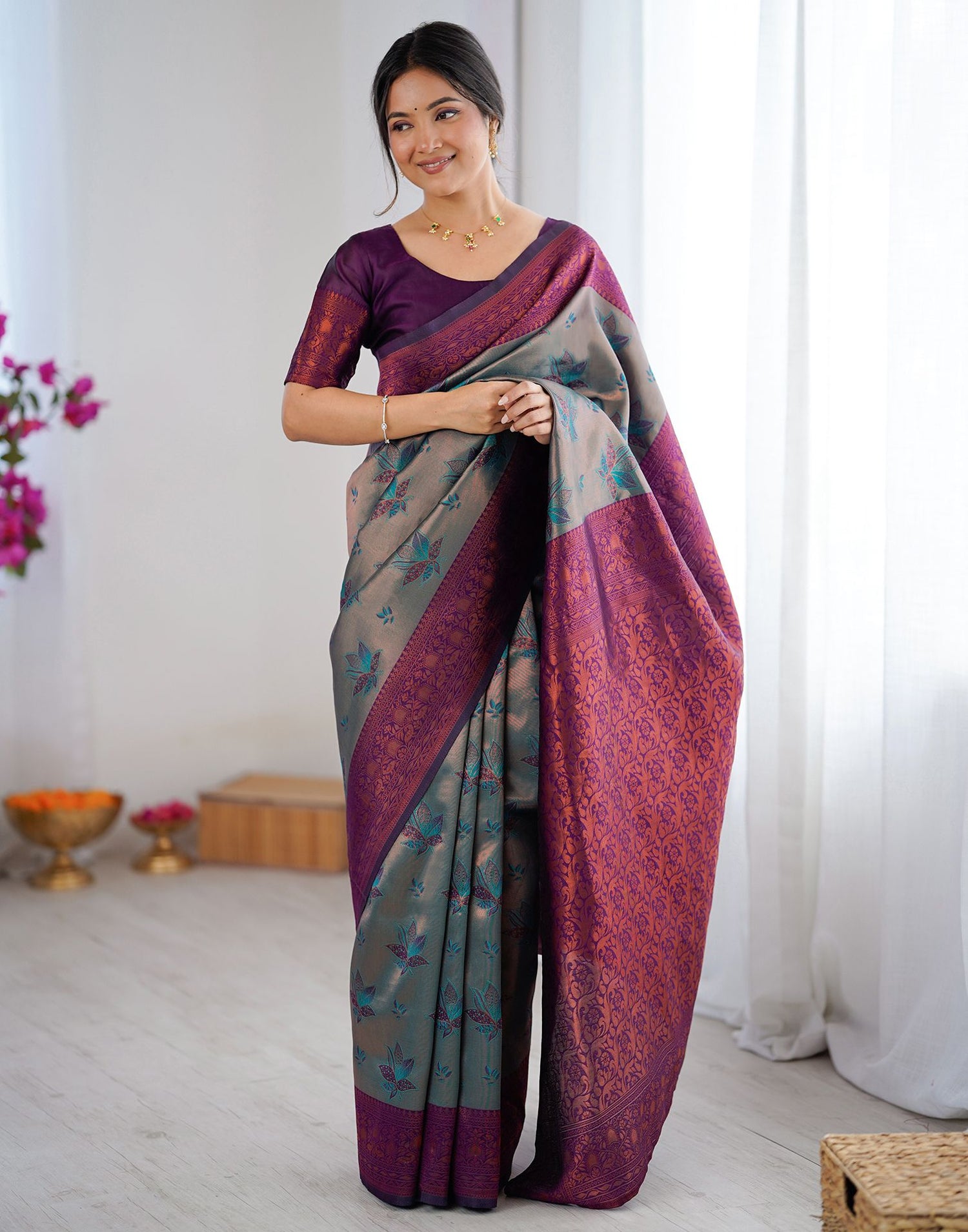 Teal Green Silk Woven Saree