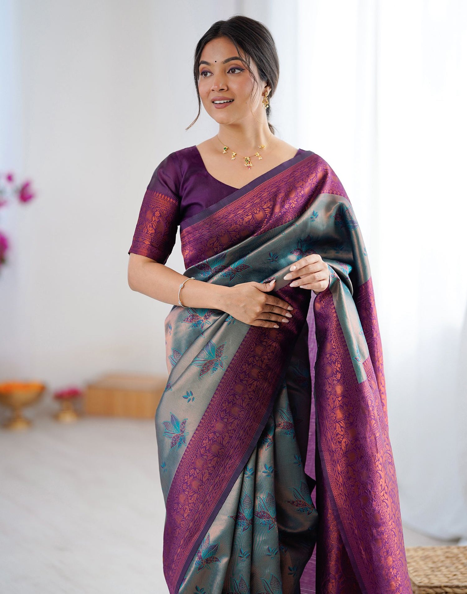 Teal Green Silk Woven Saree