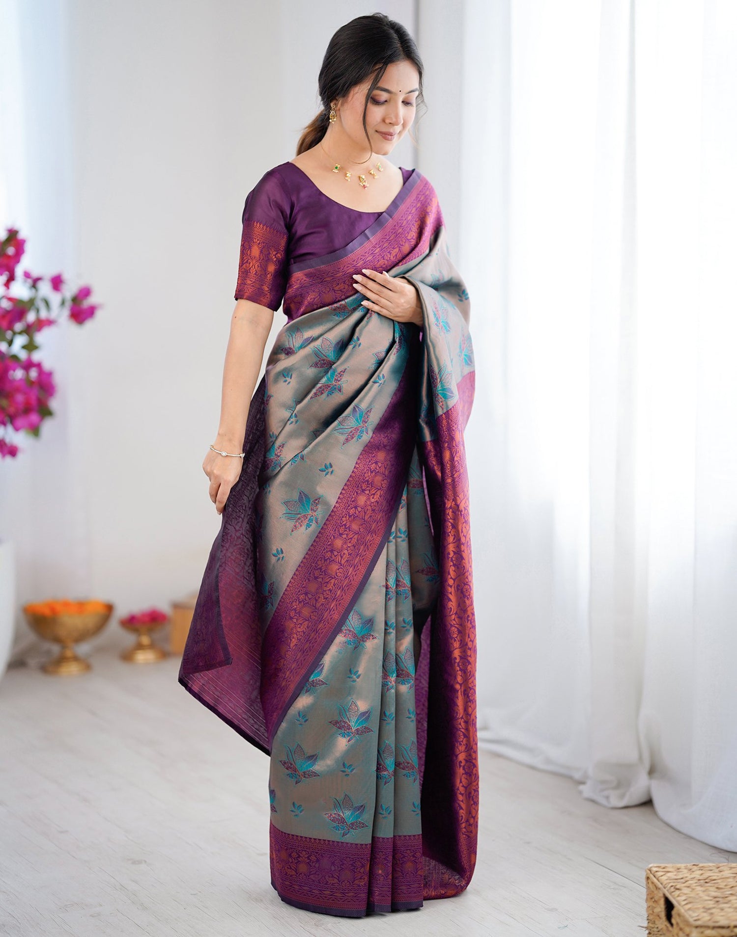 Teal Green Silk Woven Saree