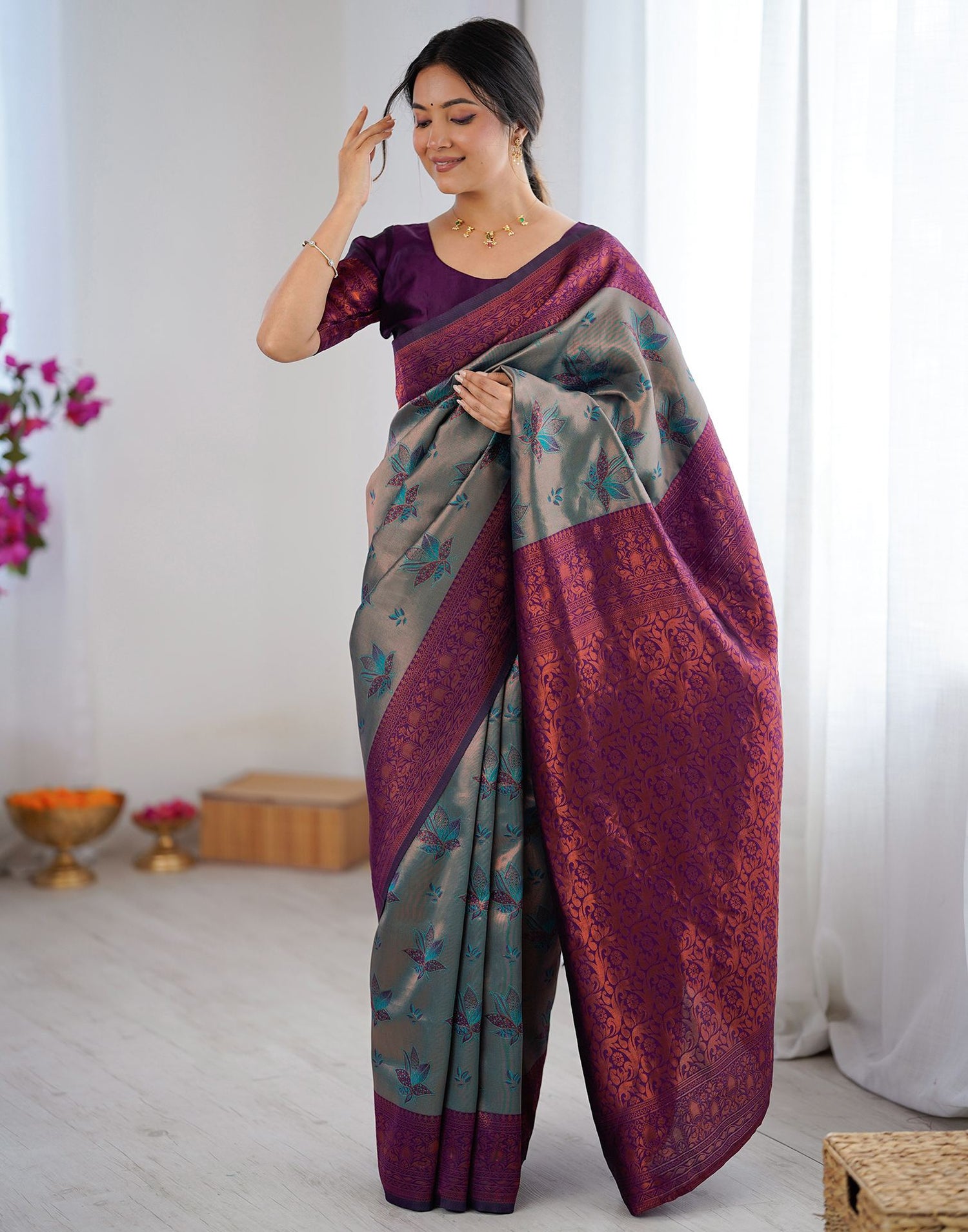 Teal Green Silk Woven Saree