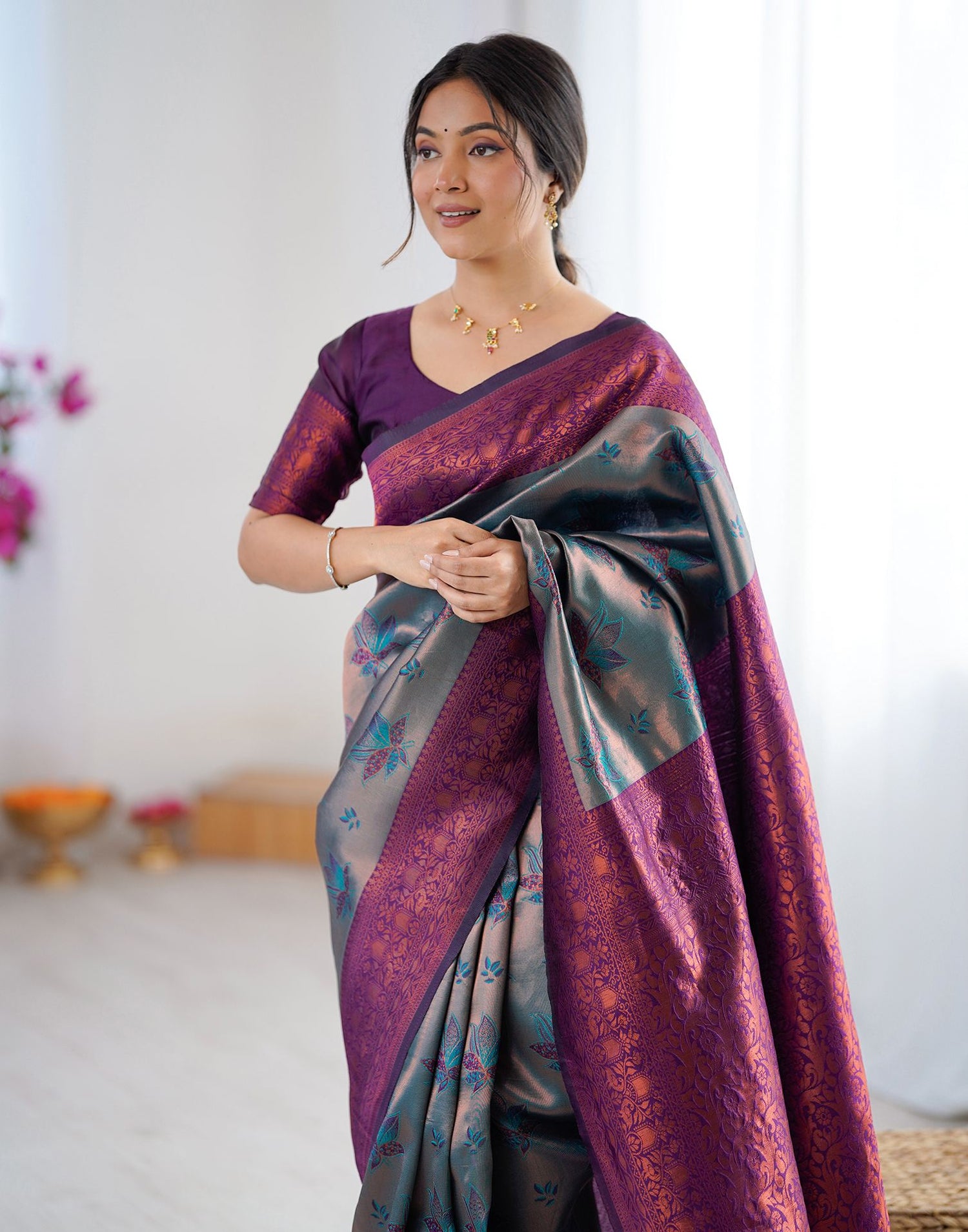 Teal Green Silk Woven Saree