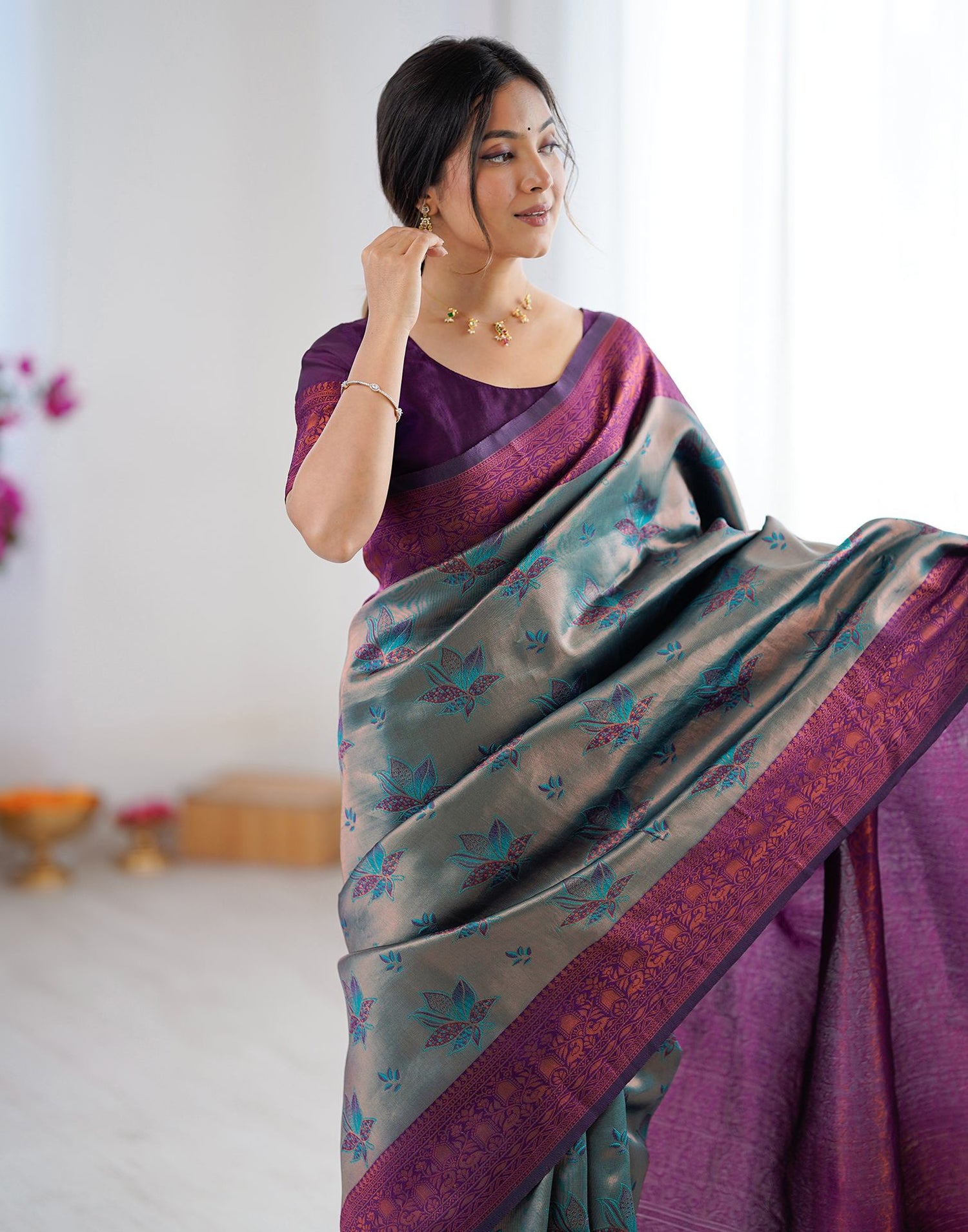 Teal Green Silk Woven Saree