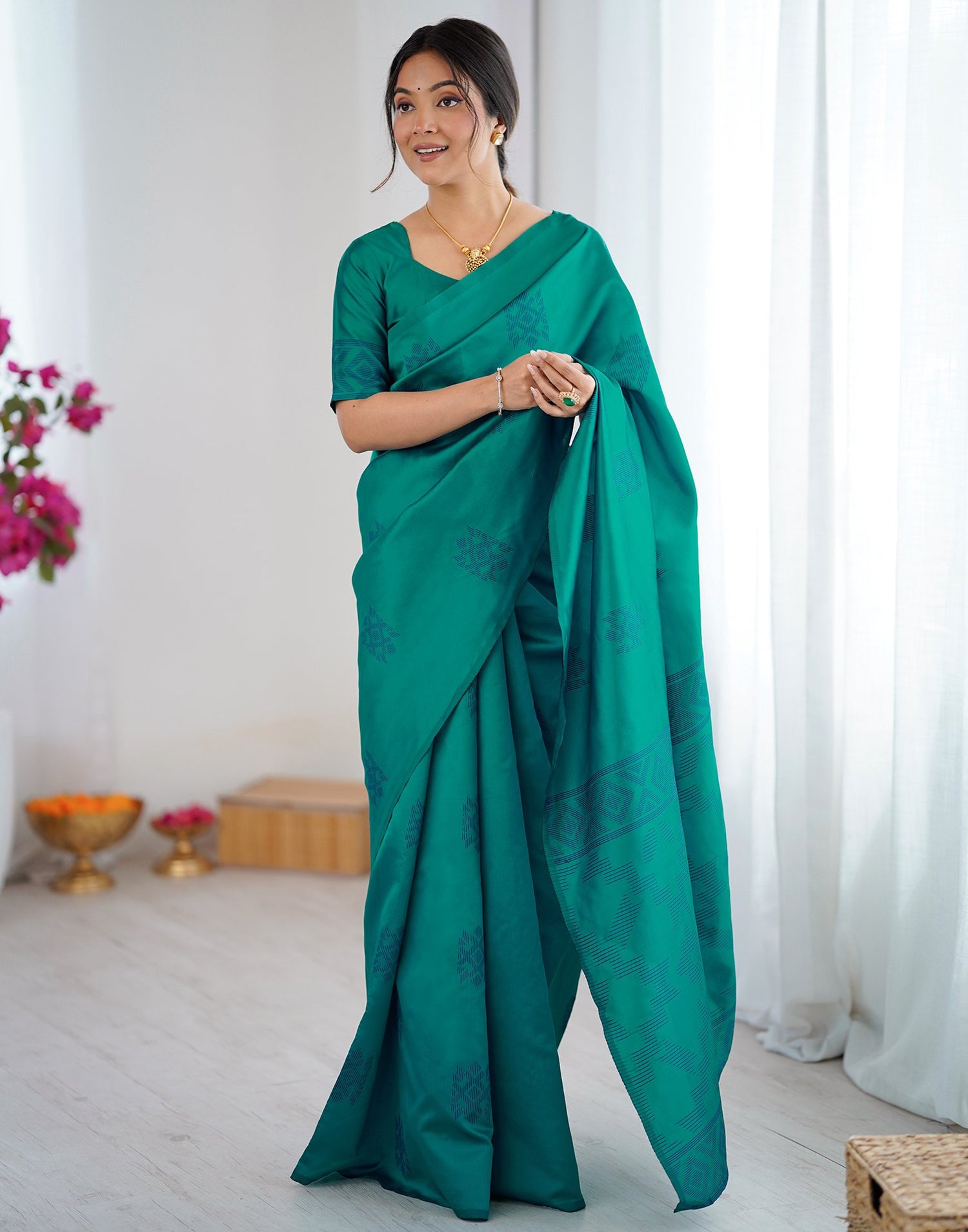 Teal Green Silk Woven Saree