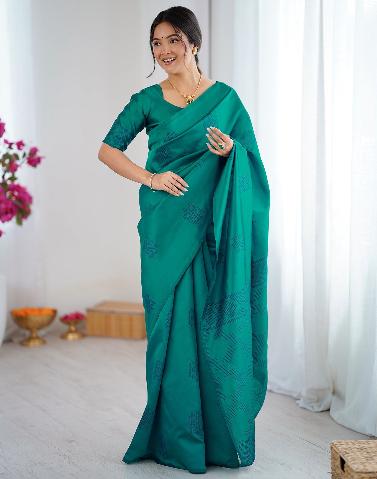 Teal Green Silk Woven Saree