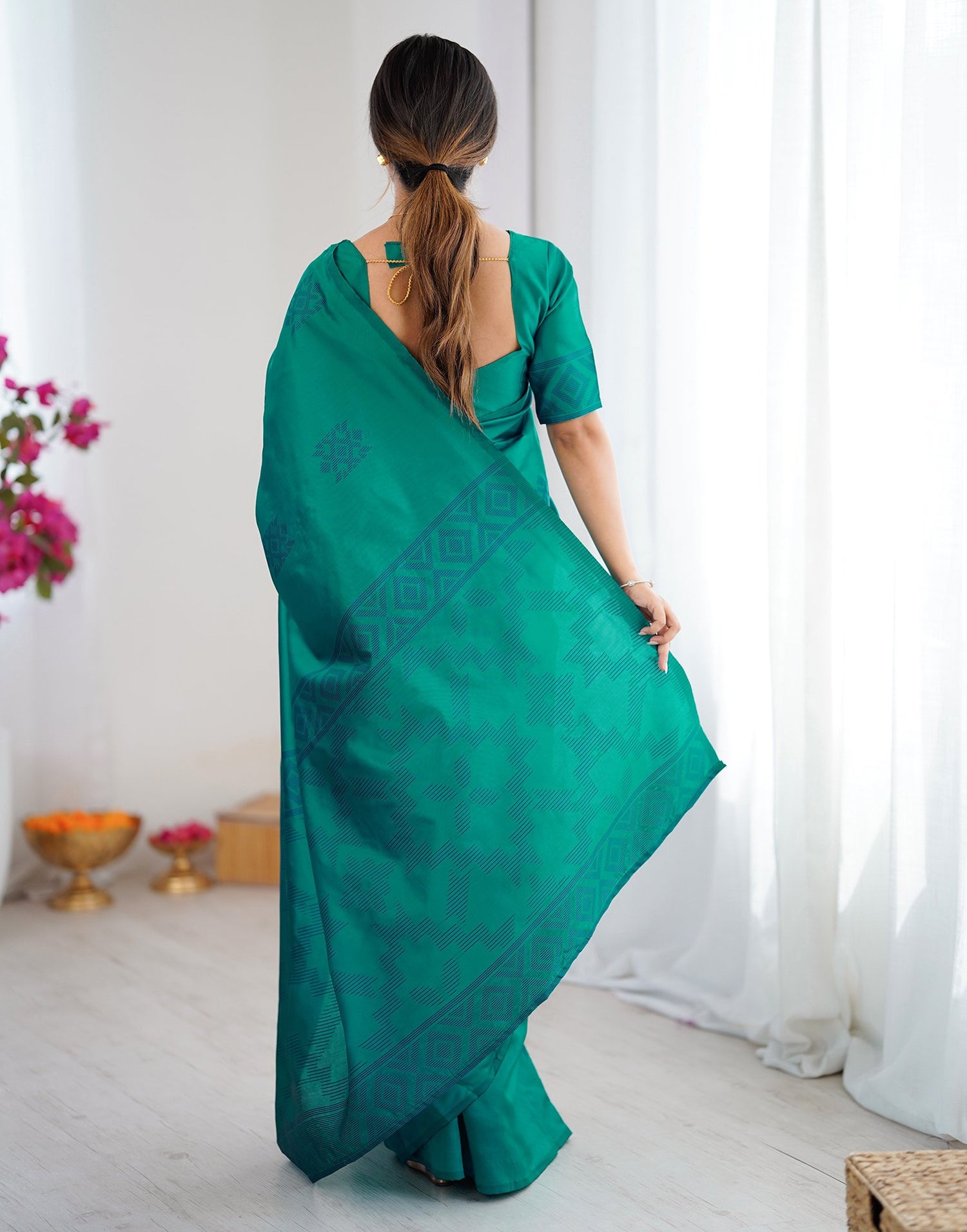Teal Green Silk Woven Saree