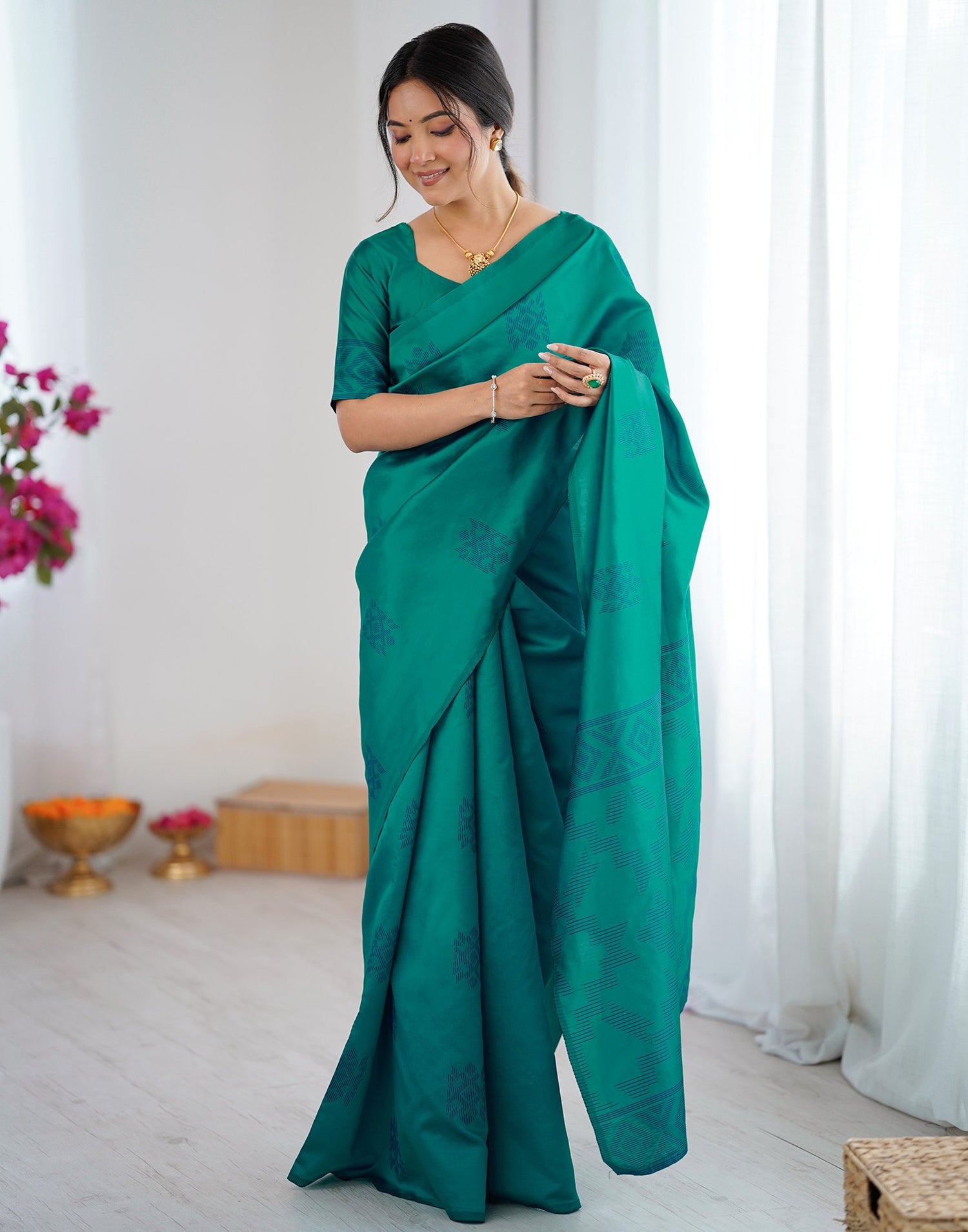 Teal Green Silk Woven Saree