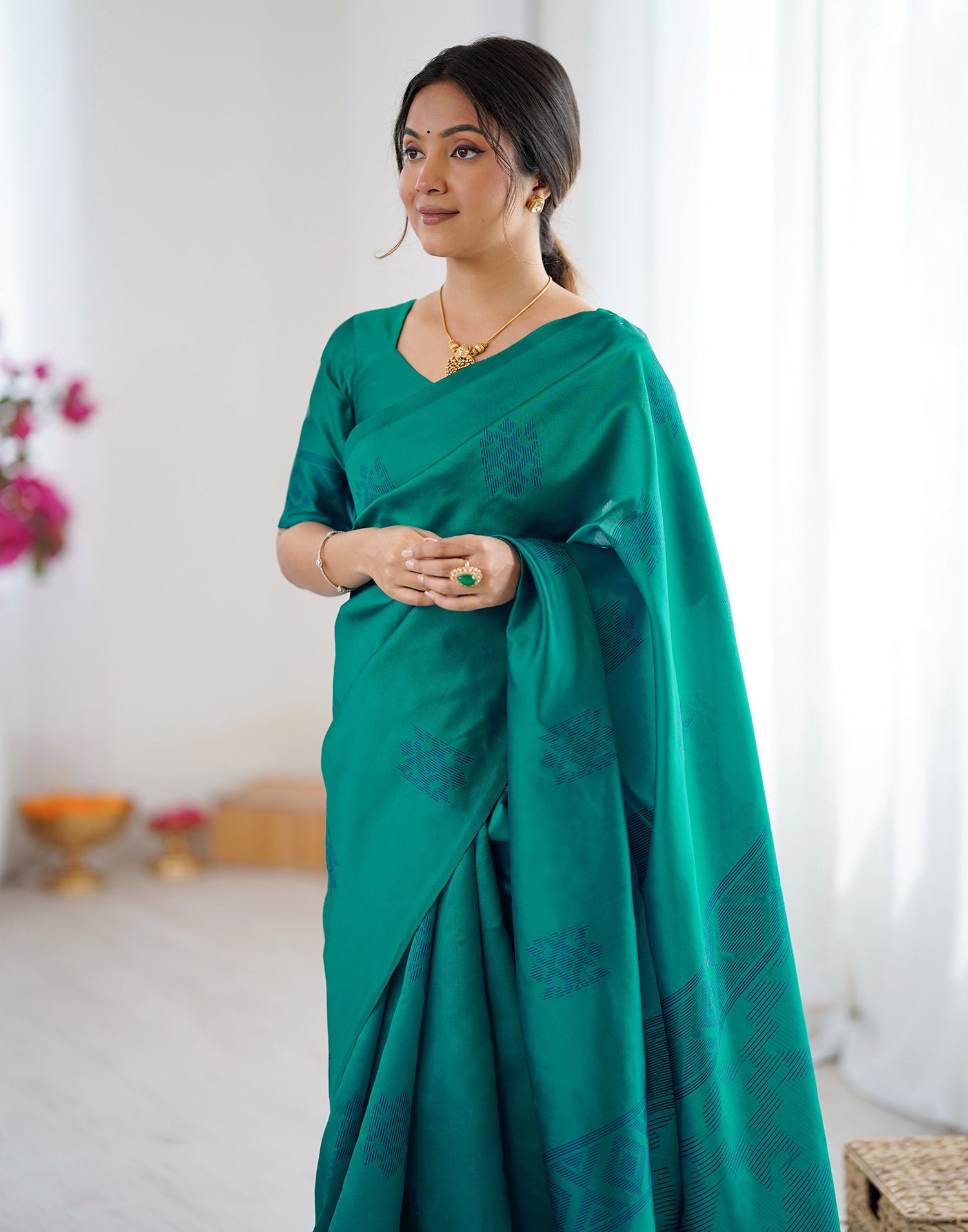 Teal Green Silk Woven Saree
