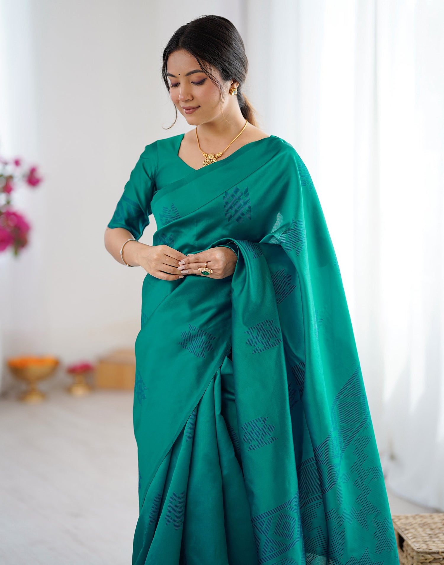 Teal Green Silk Woven Saree