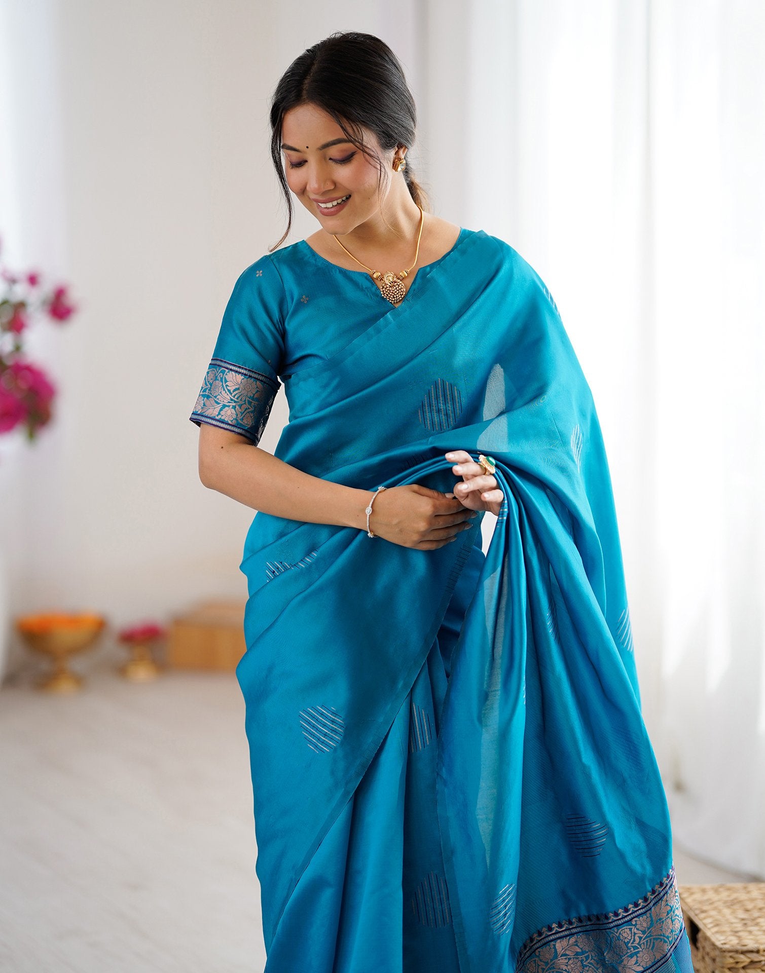 Teal Blue Silk Woven Saree