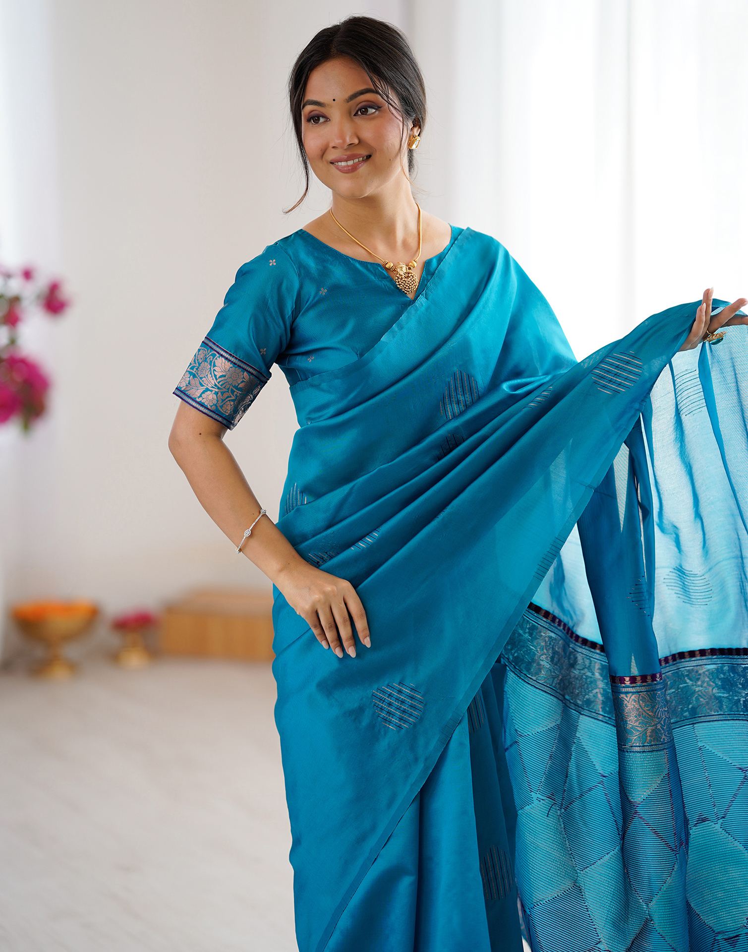 Teal Blue Silk Woven Saree