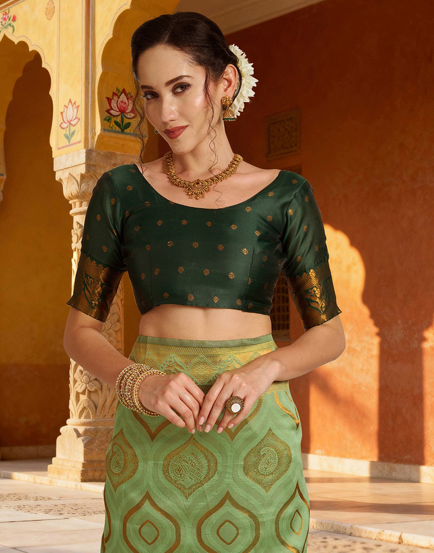 Pista Green Silk Woven Saree