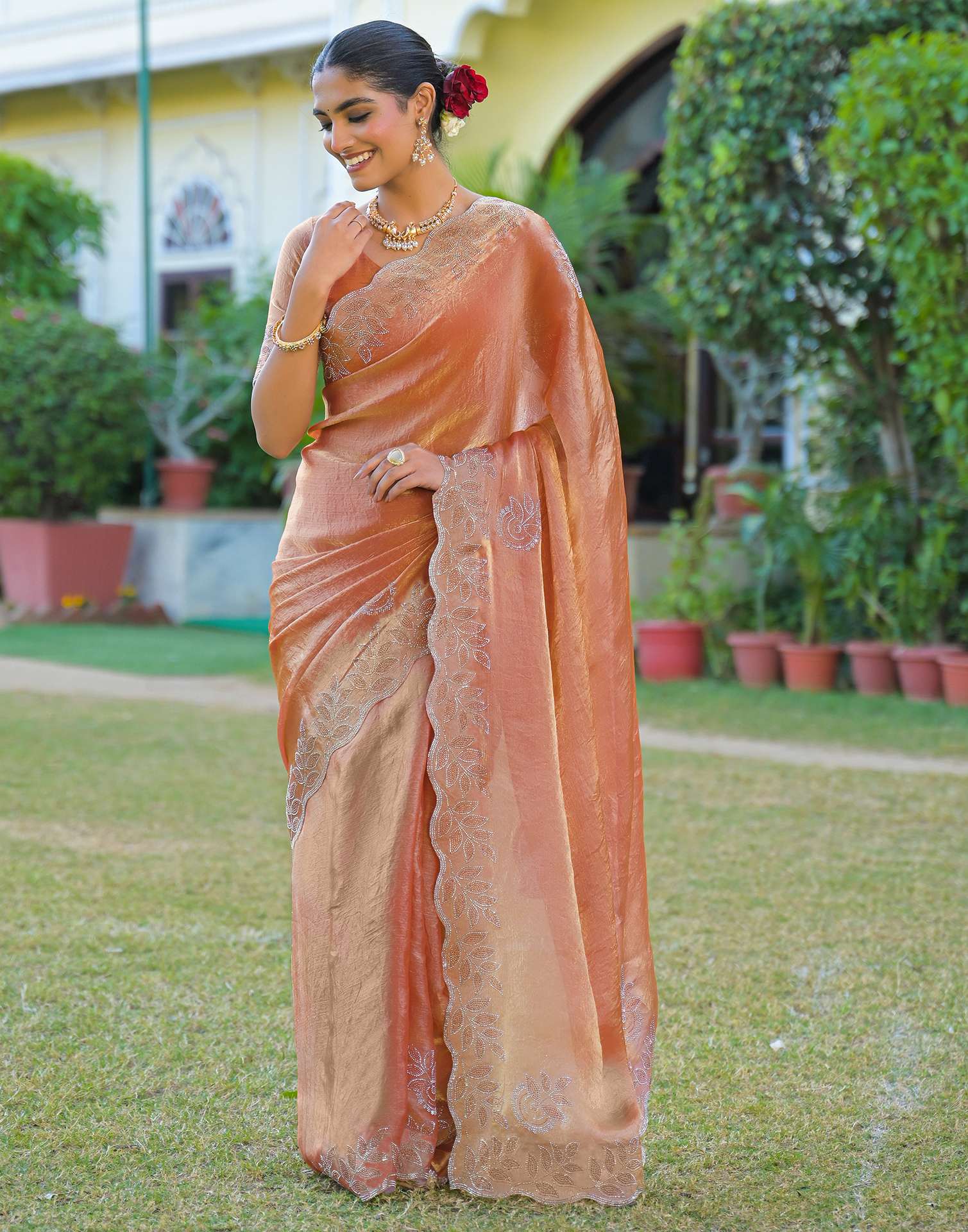 Peach Shimmer Stone Work Embellished Saree
