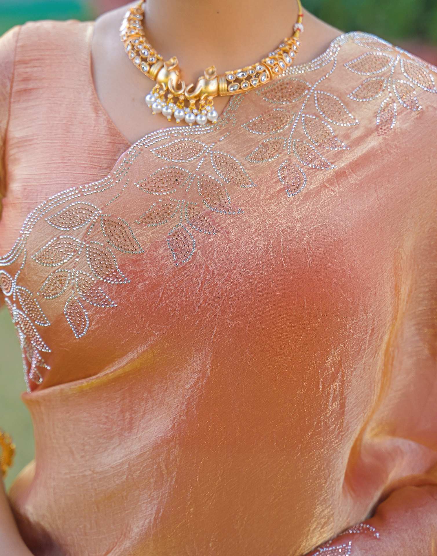 Peach Shimmer Stone Work Embellished Saree