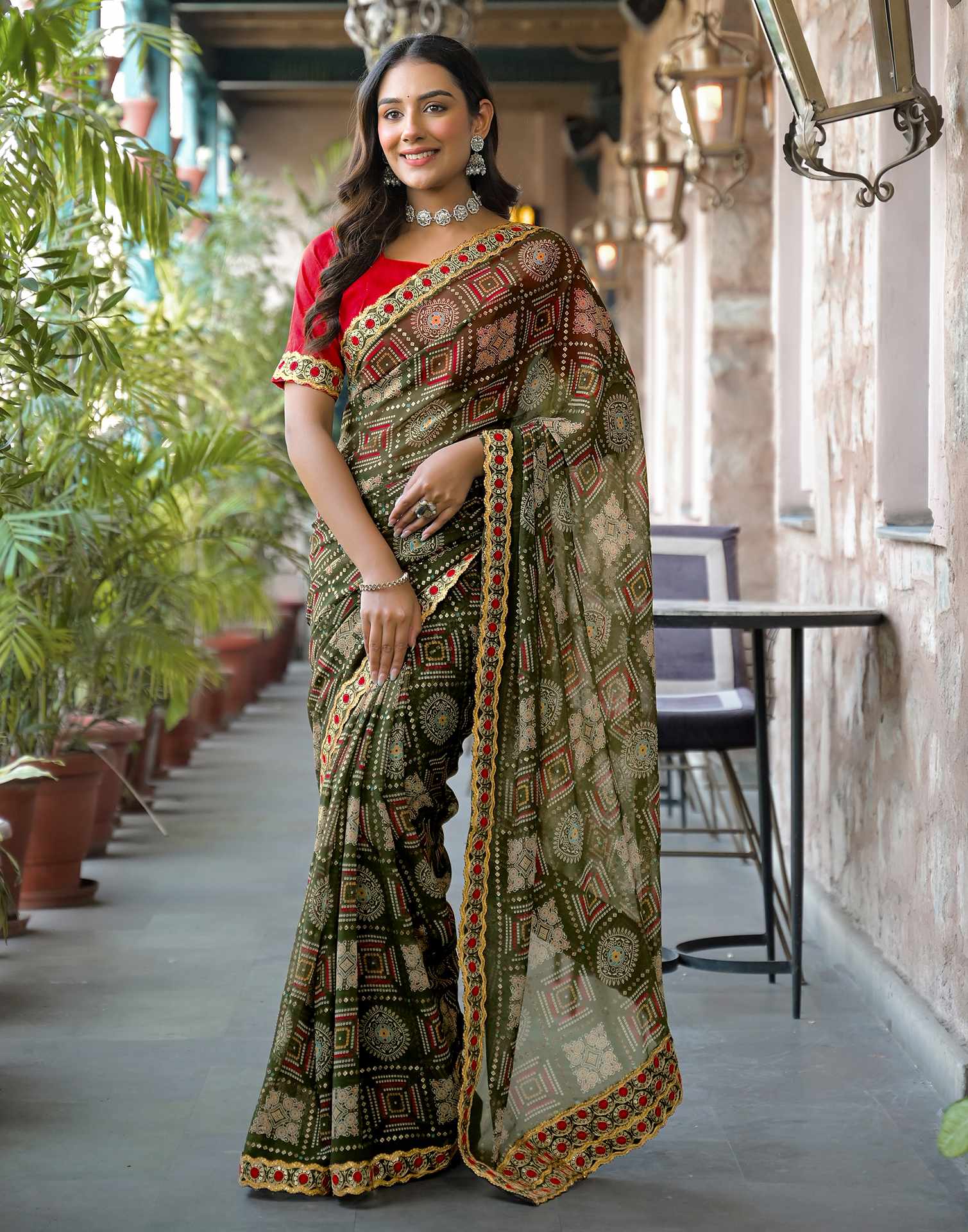 Dark Green Georgette Bandhani Printed Lace Saree