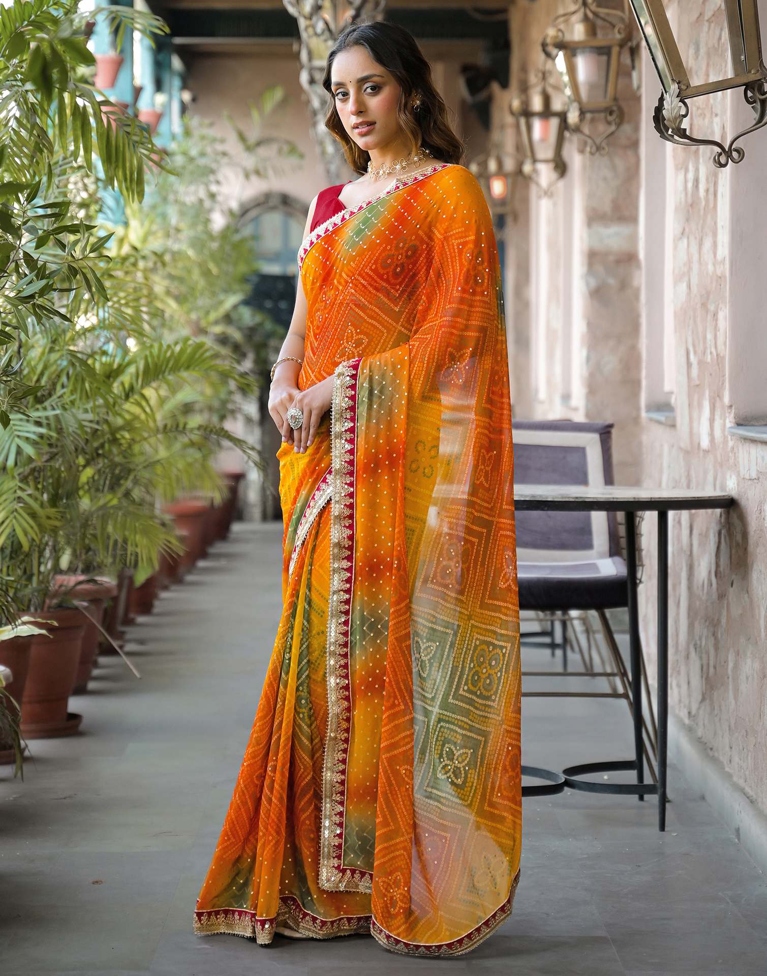 Orange Georgette Bandhani Printed Lace Saree
