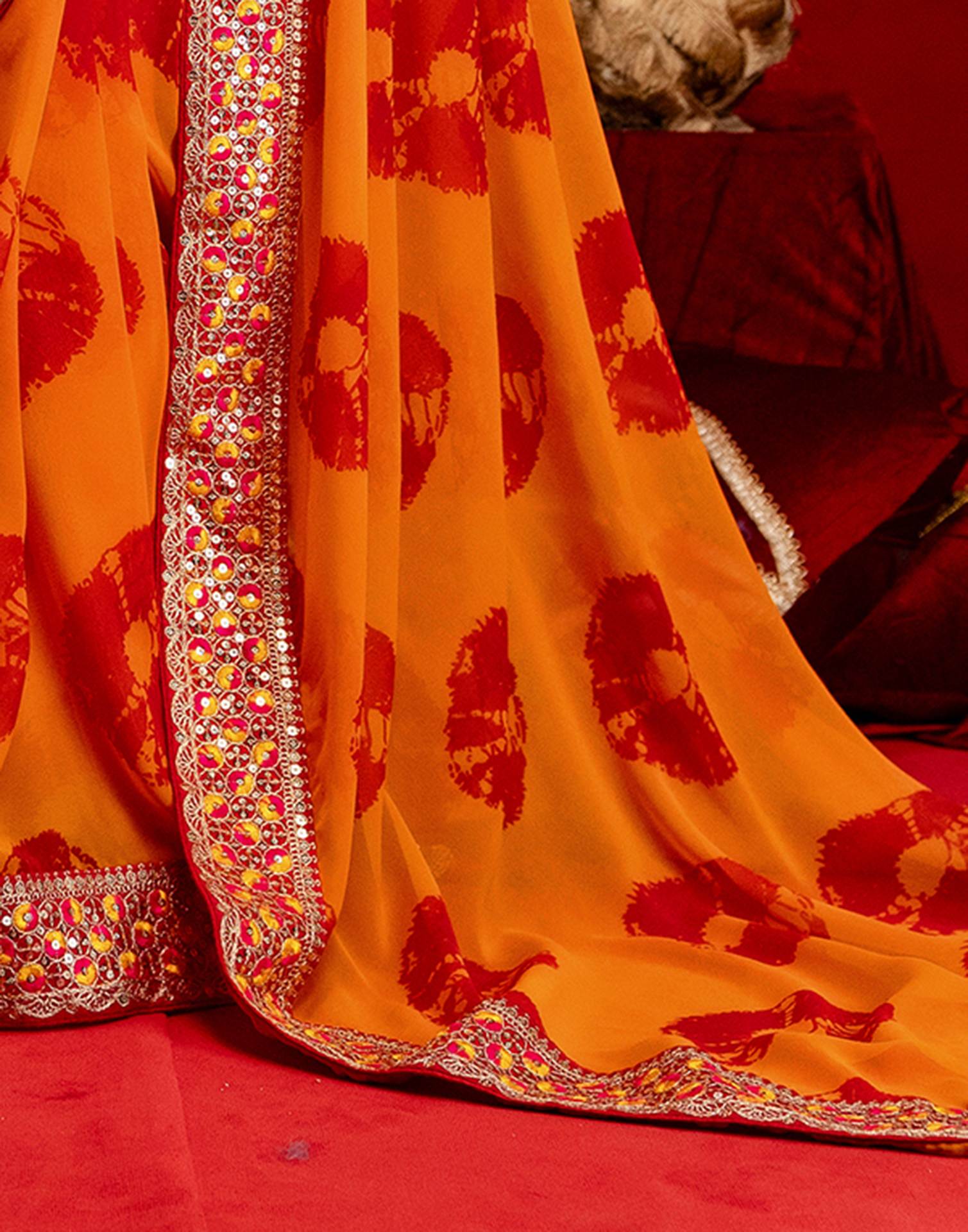 Orange Georgette Bandhani Printed Lace Saree