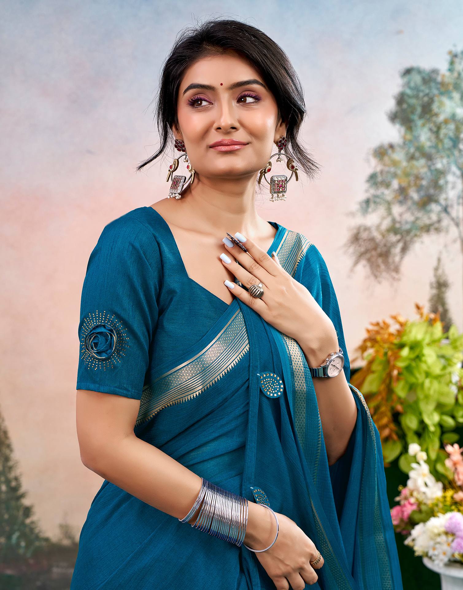 Peacock Blue Chiffon Woven Border Saree