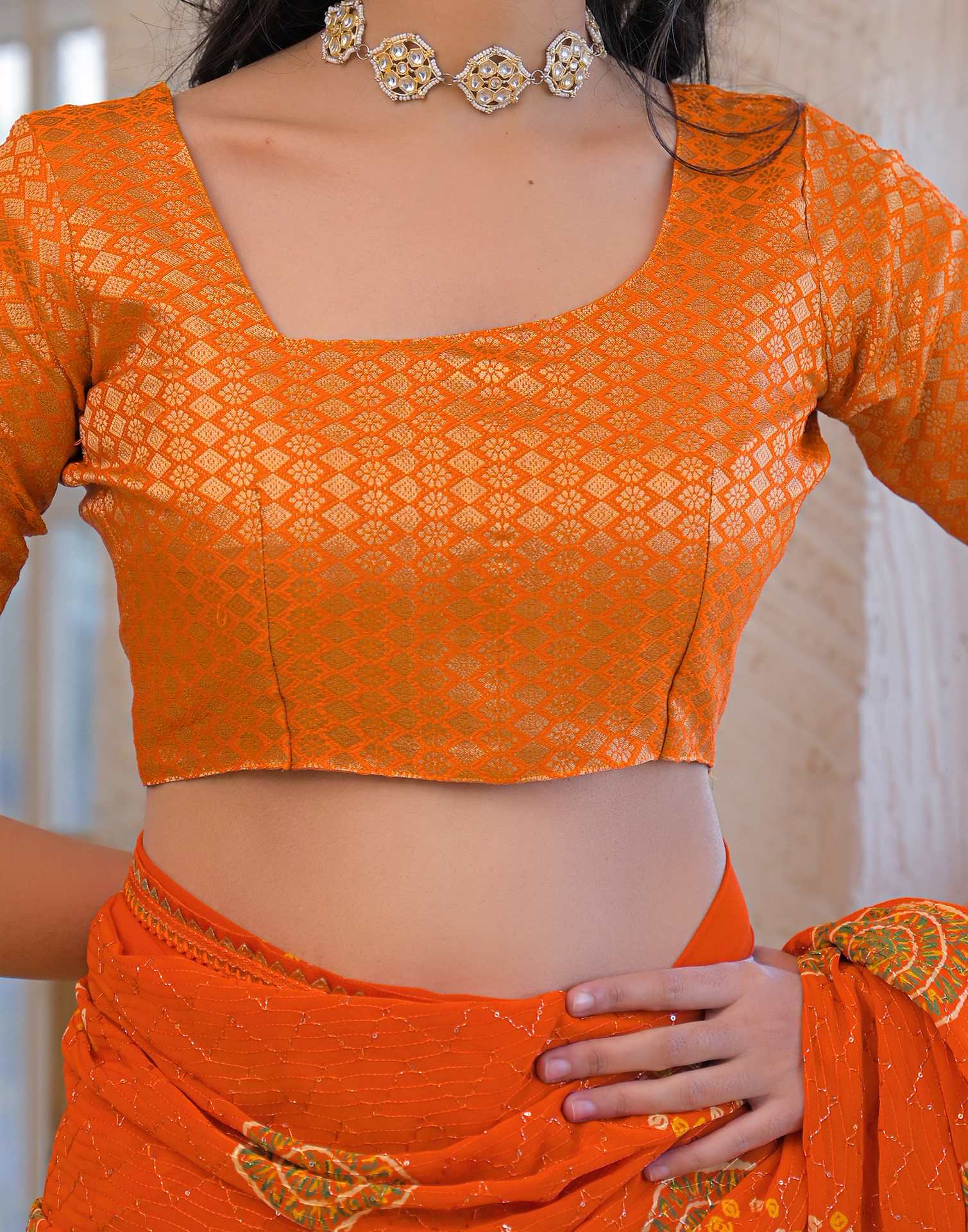 Orange Georgette Bandhani Printed Lace Saree