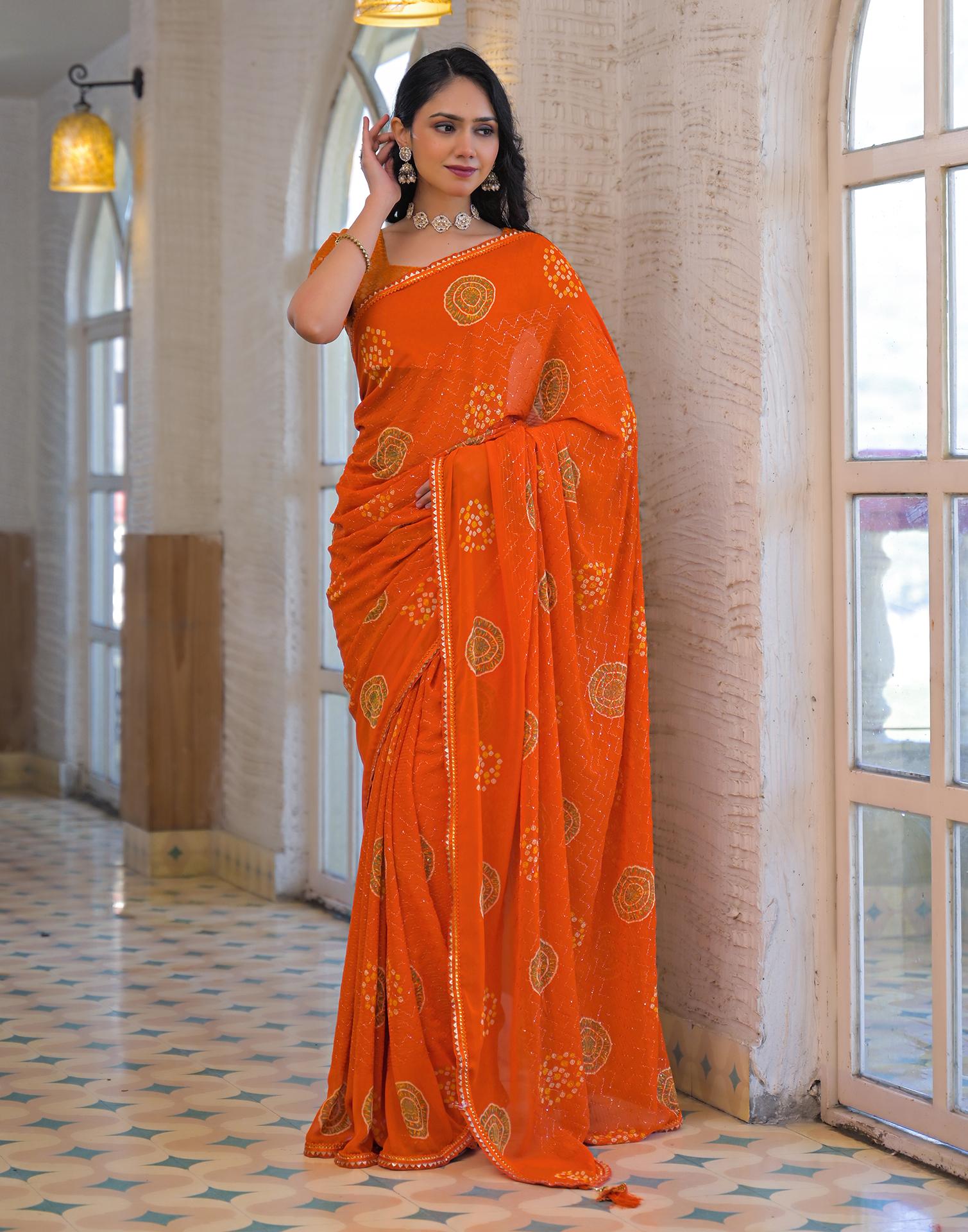 Orange Georgette Bandhani Printed Lace Saree