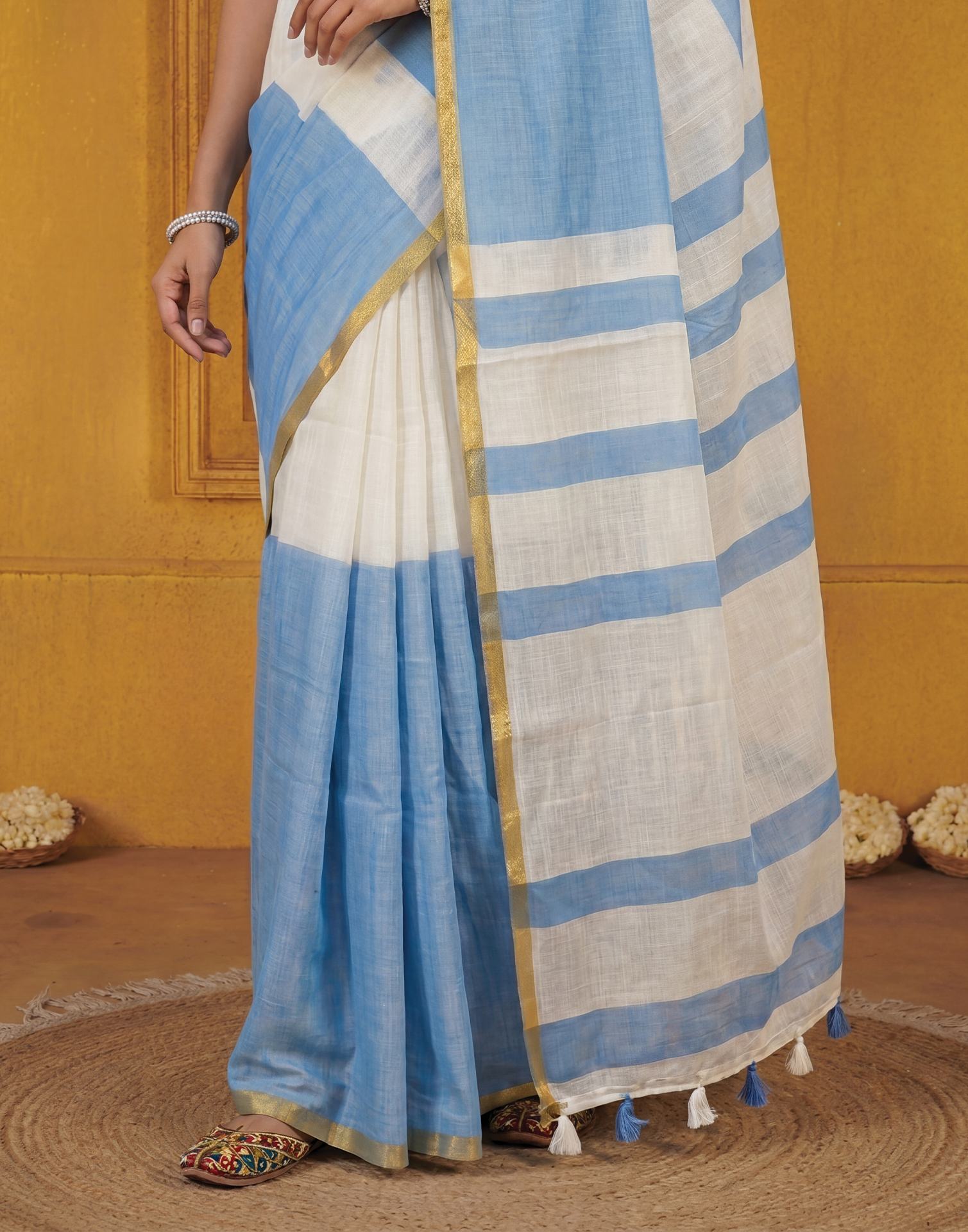 Light Blue Linen Printed Zari Border Saree