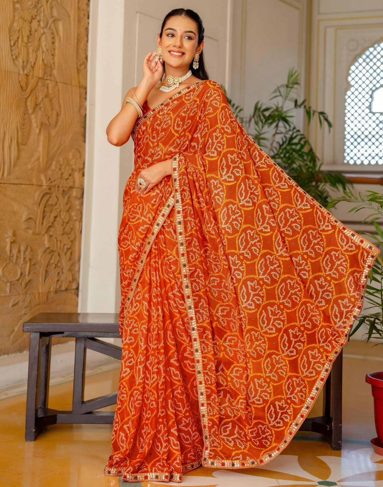 Orange Chiffon Bandhani Printed Lace Saree