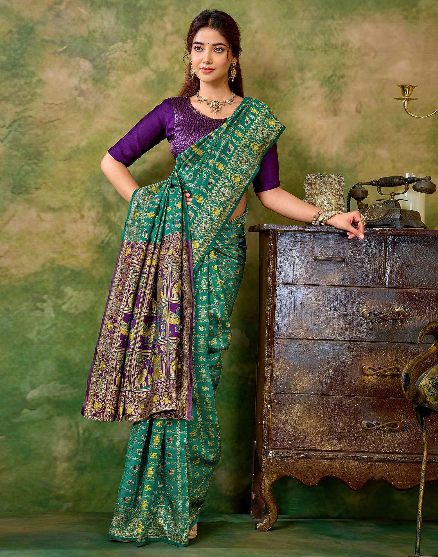 Teal Green Silk Woven Patola Saree