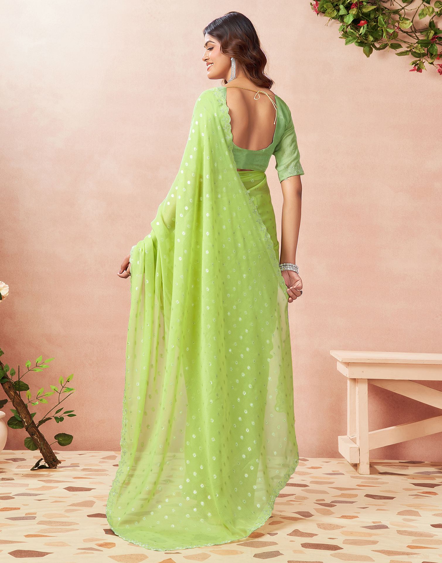 Pista Green Georgette Stone Work Embellished Saree