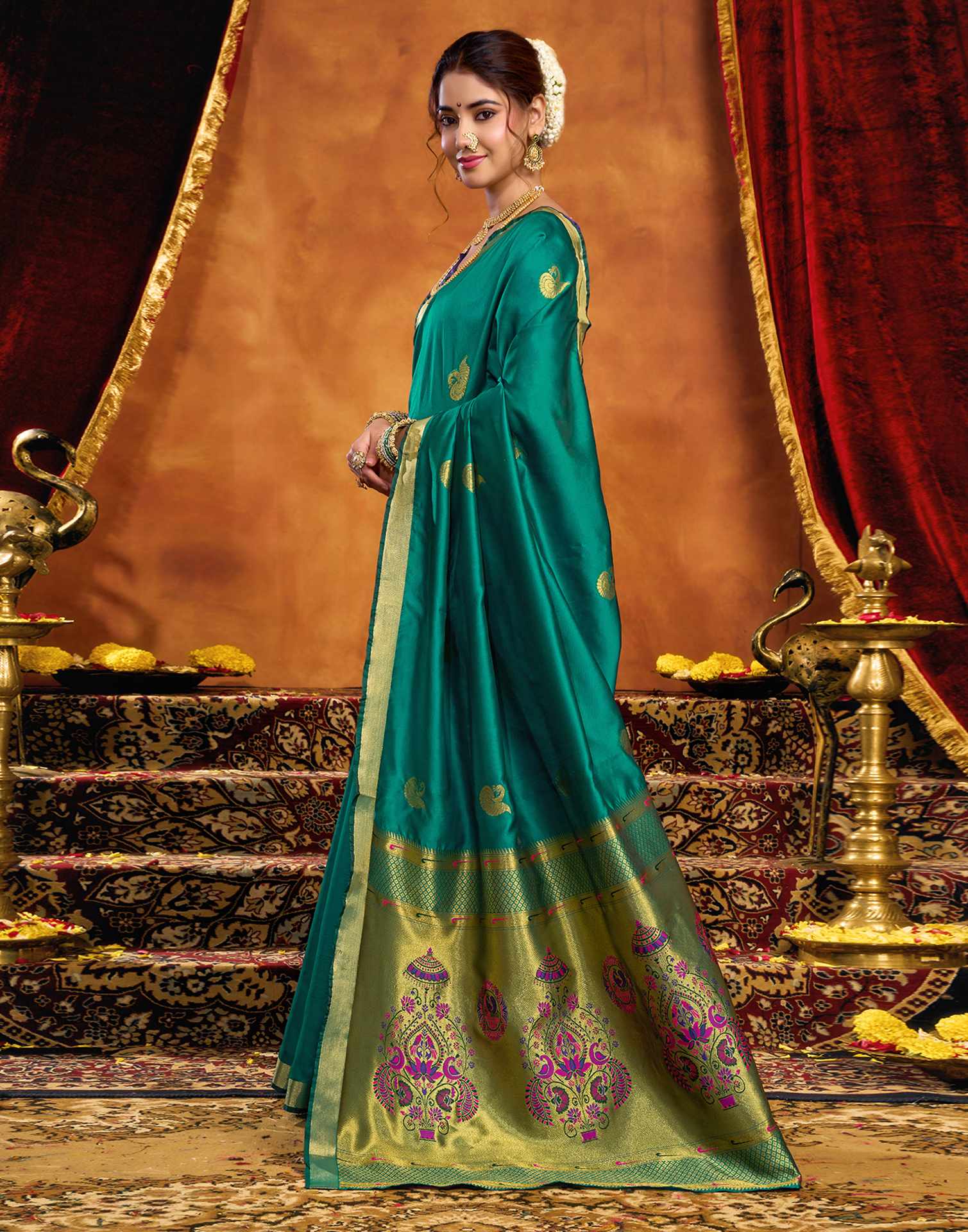 Teal Green Silk Woven Paithani Saree