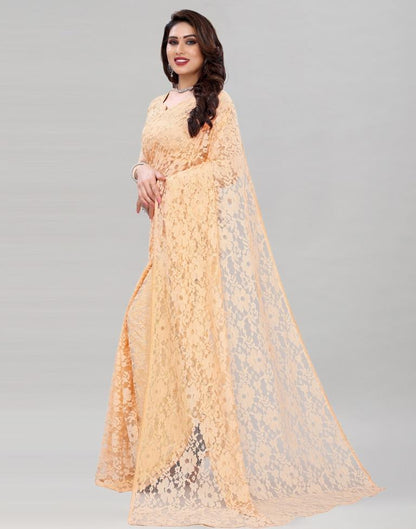 Cream Coloured Rasel Russel Net Partywear saree | Sudathi