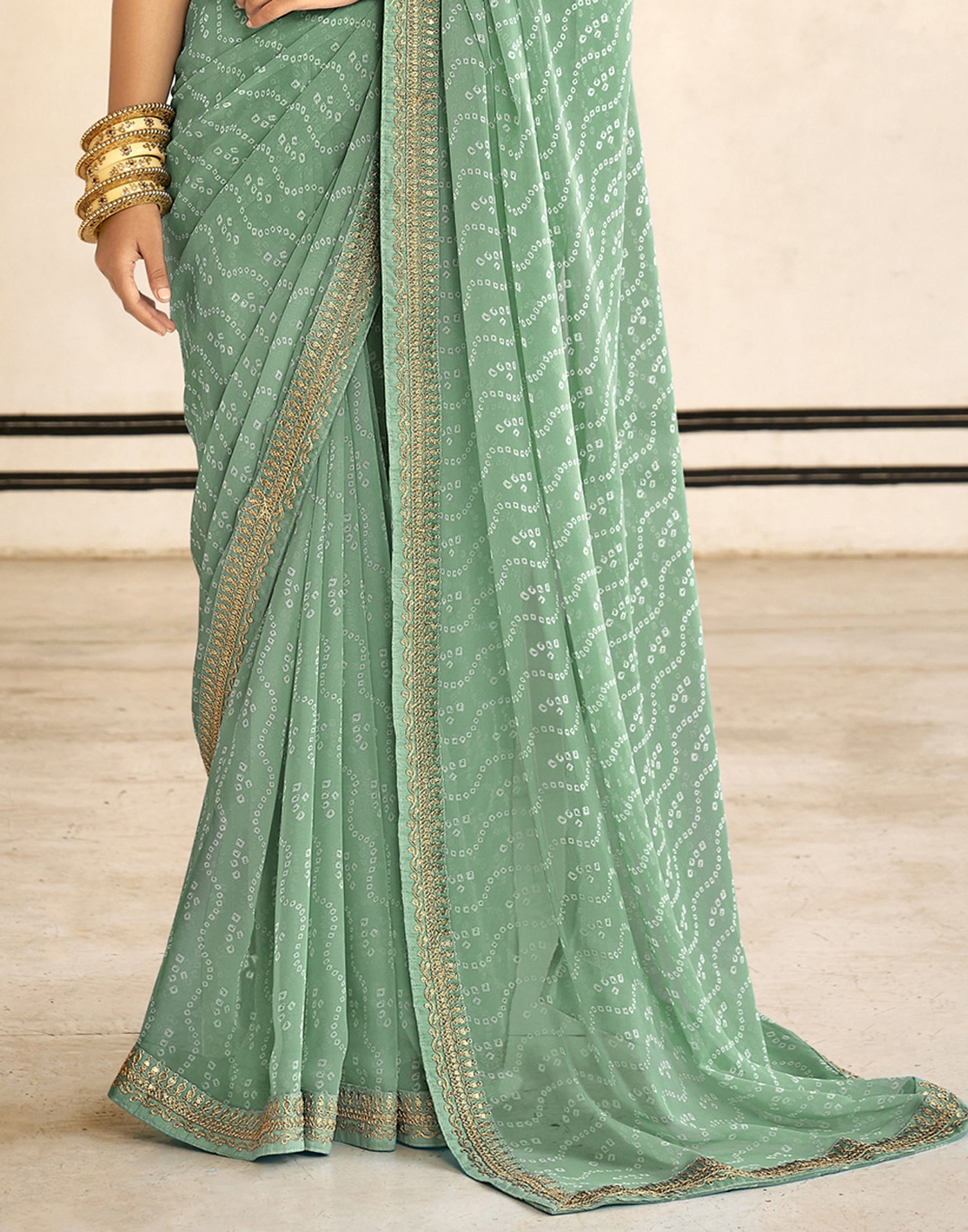 Mint Green Bandhani Saree with Embroidery Border