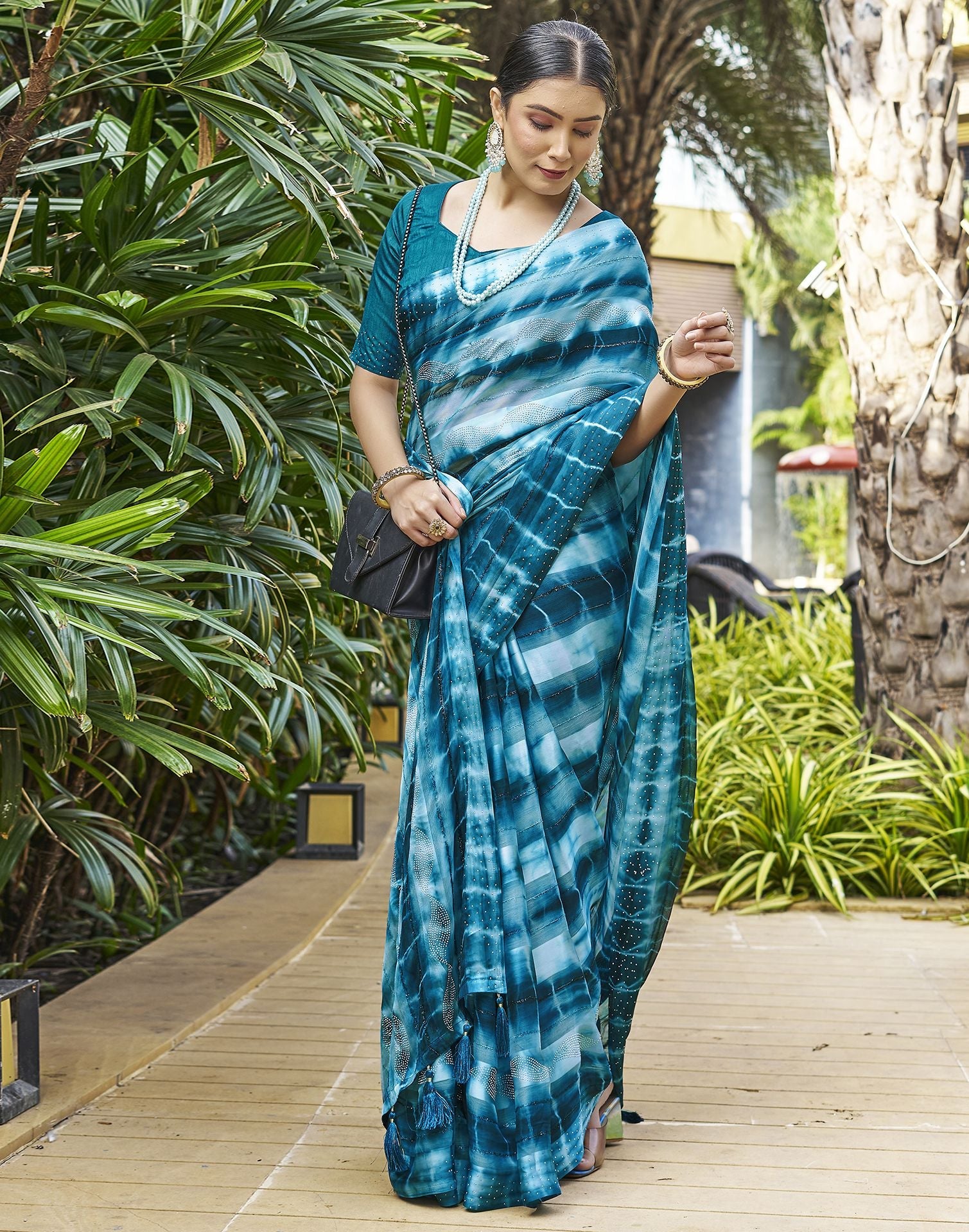 Teal Blue Printed Chiffon Saree